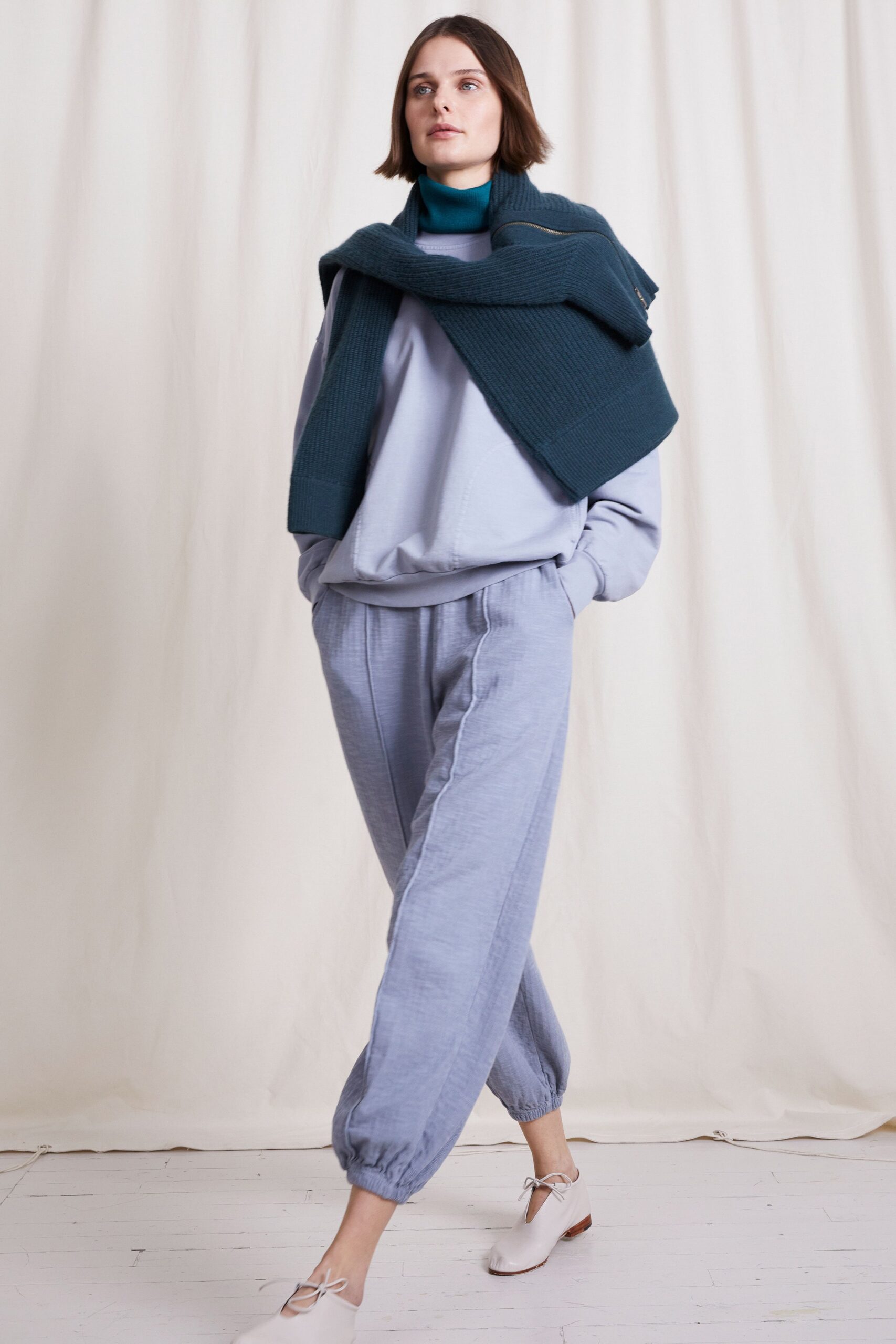 relaxed blue sweater and gray pants