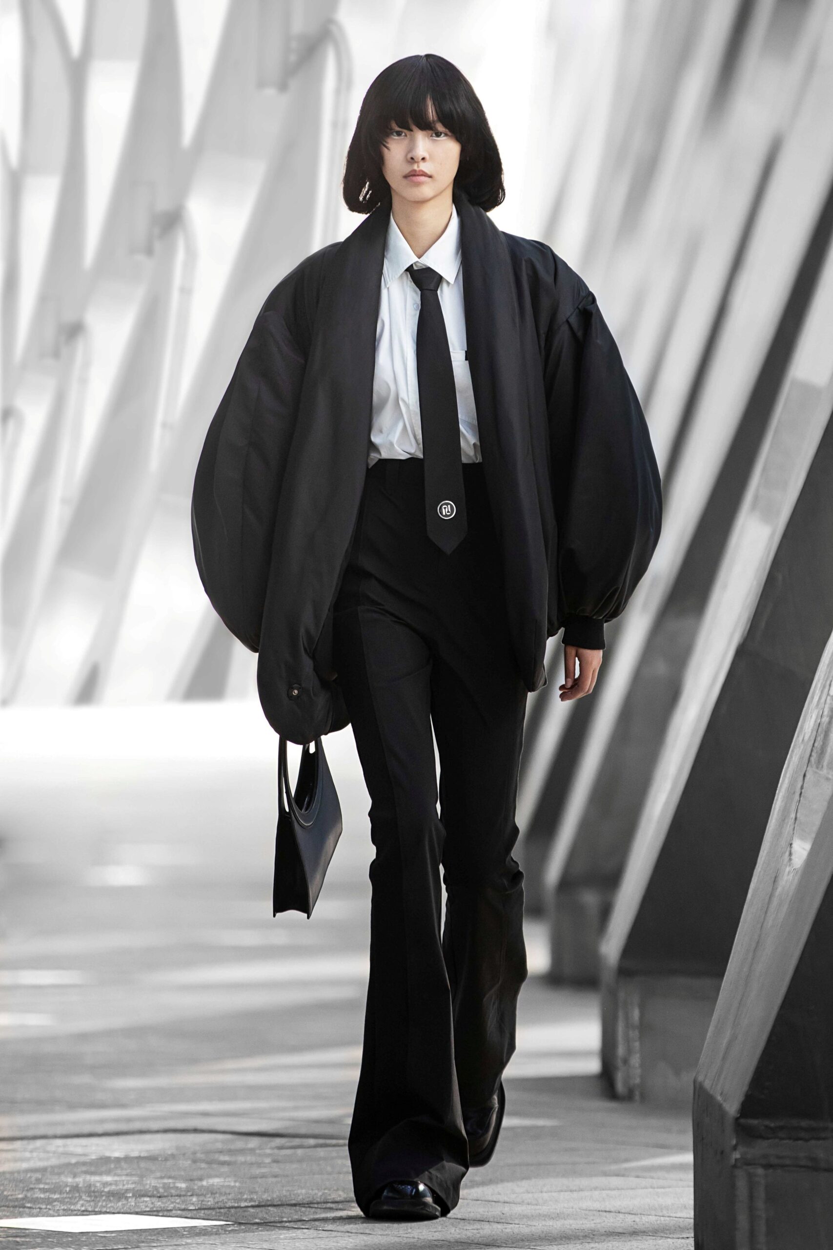 oversized black jacket with flared pants