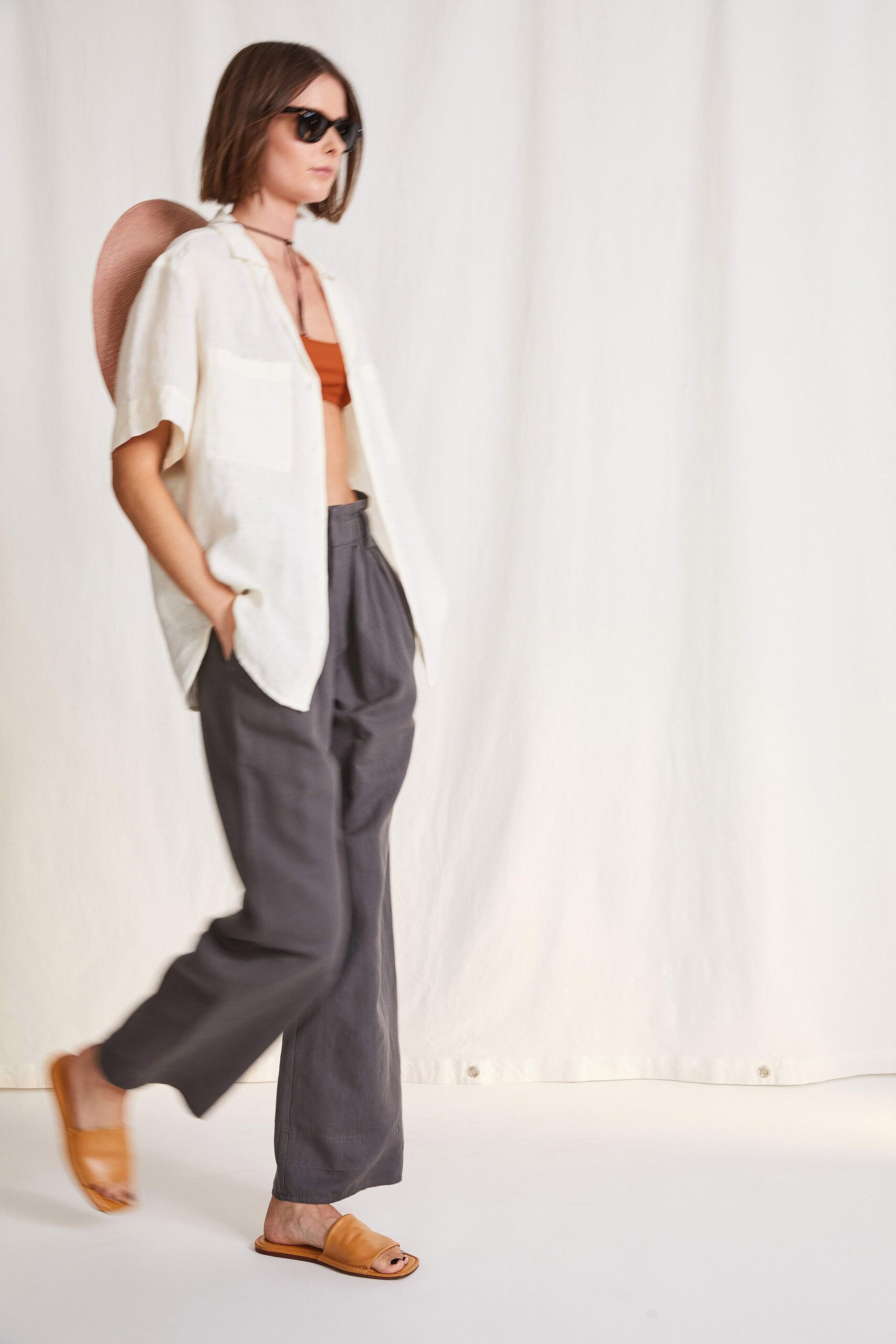 relaxed white shirt with gray pants