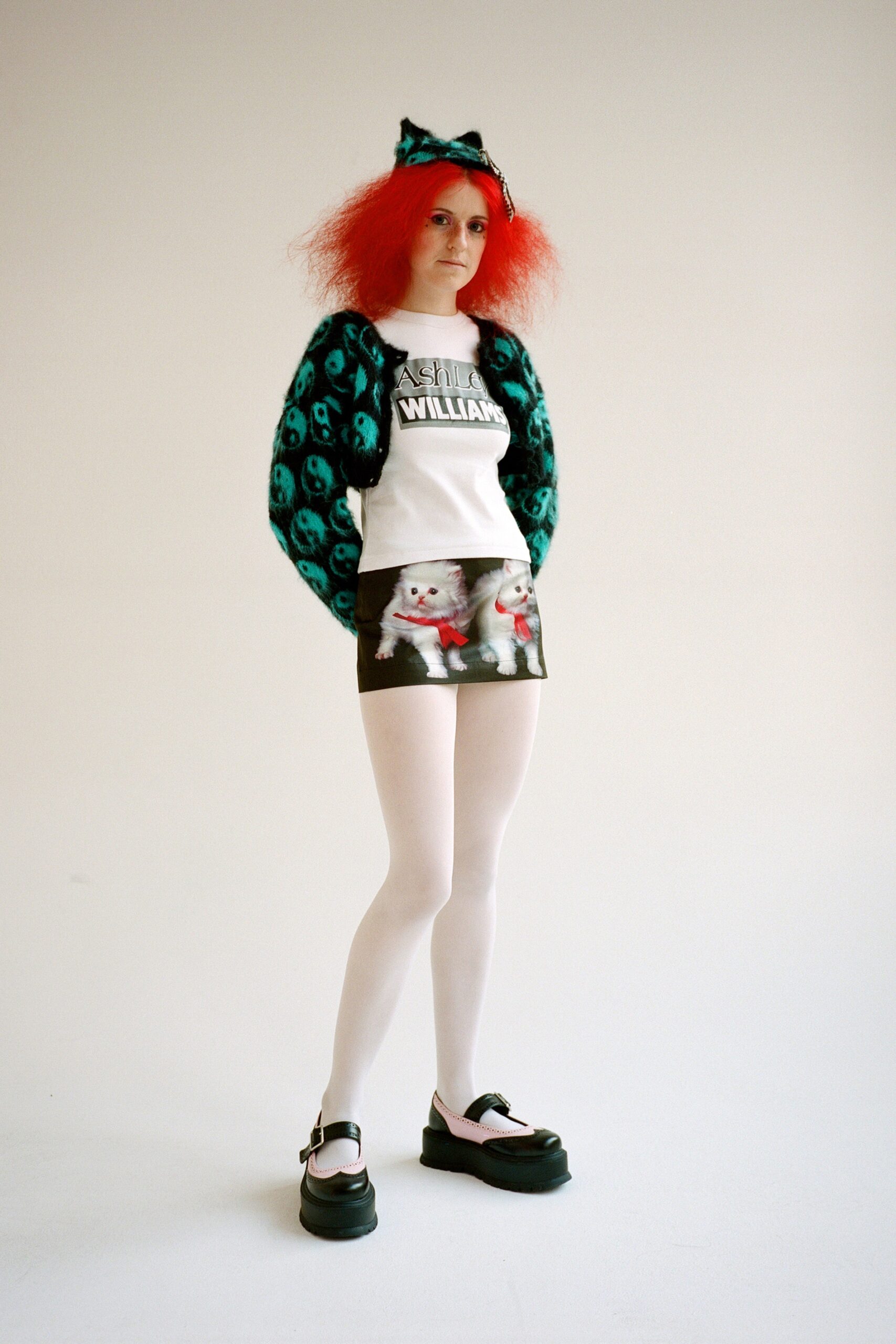 white fitted top with printed skirt