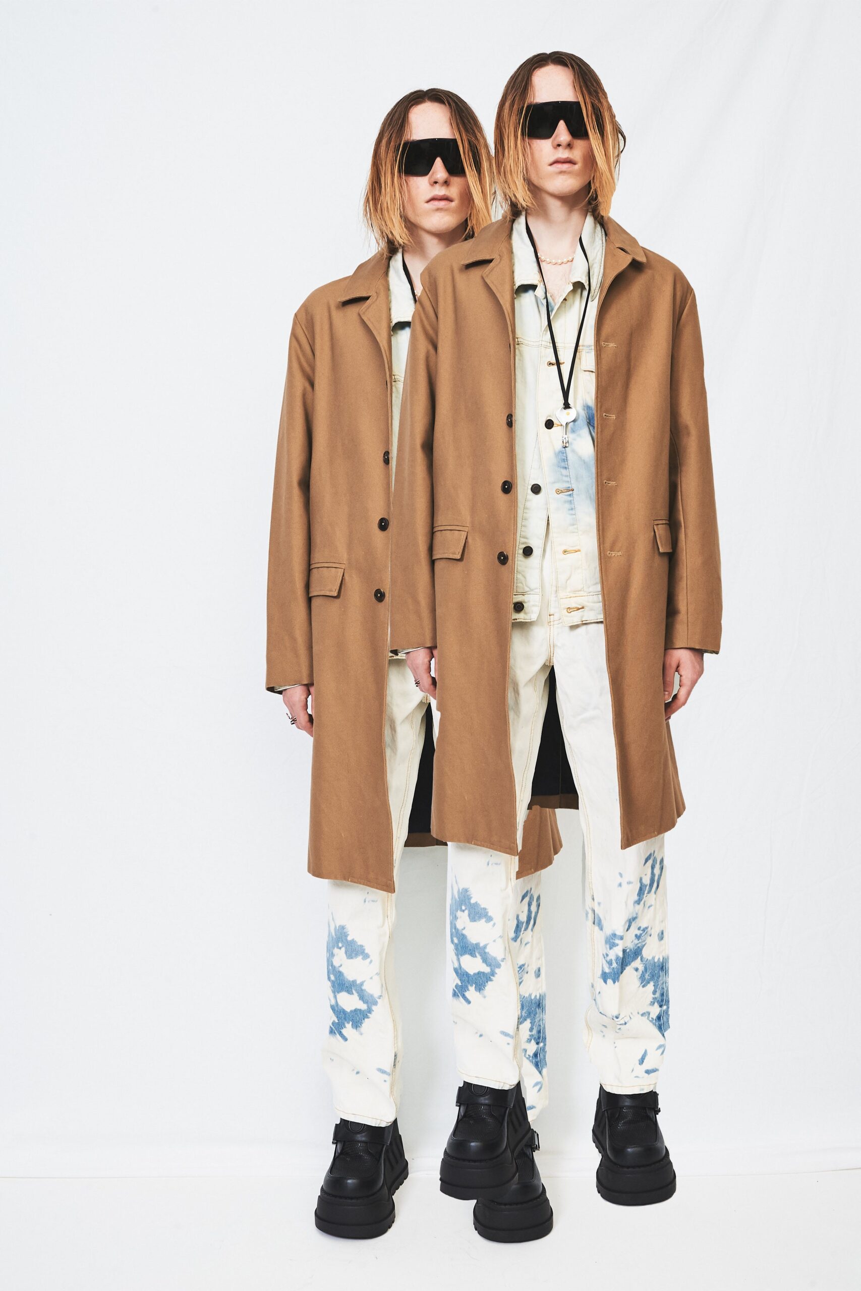 brown coat with distressed pants