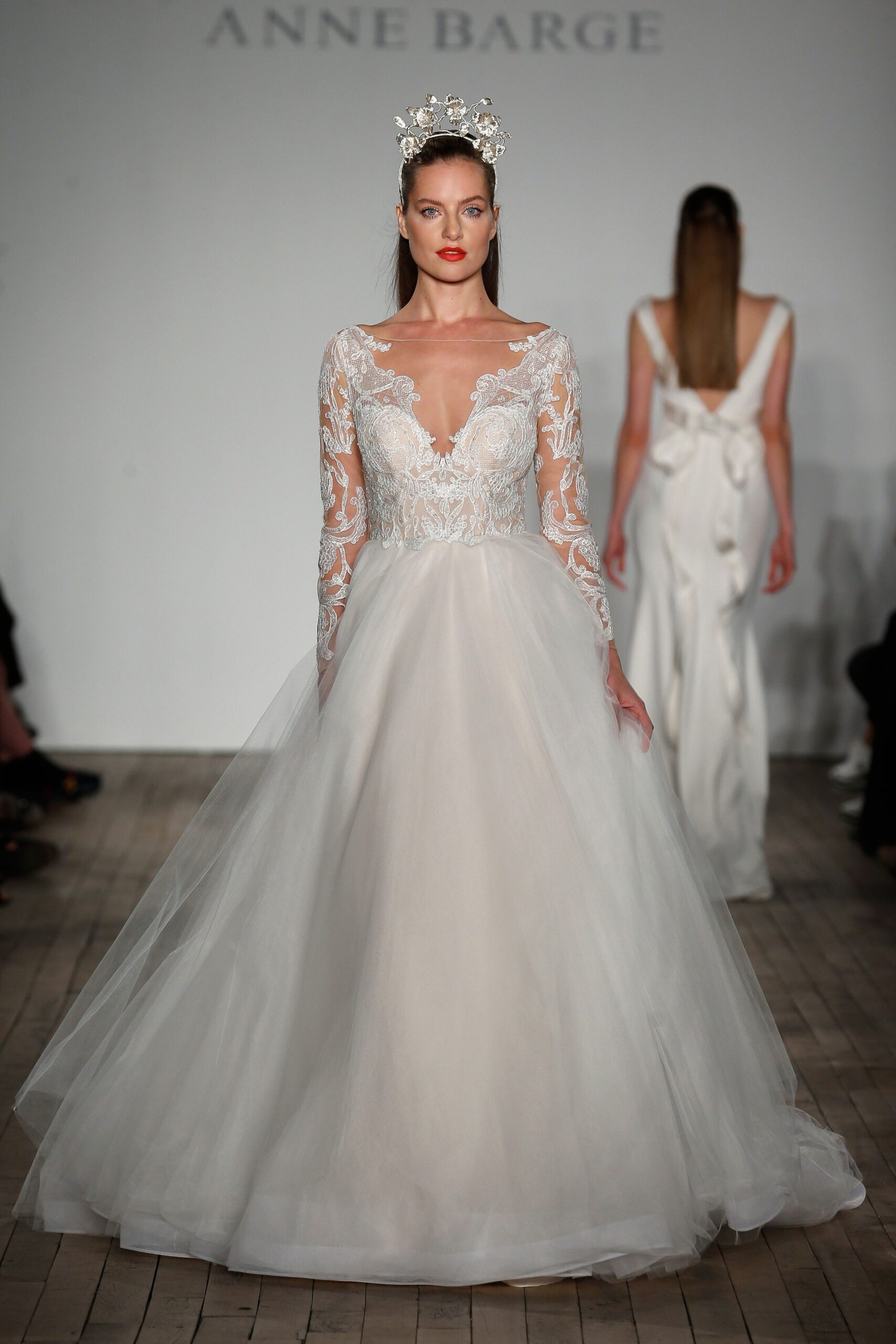 white embroidered long-sleeve gown