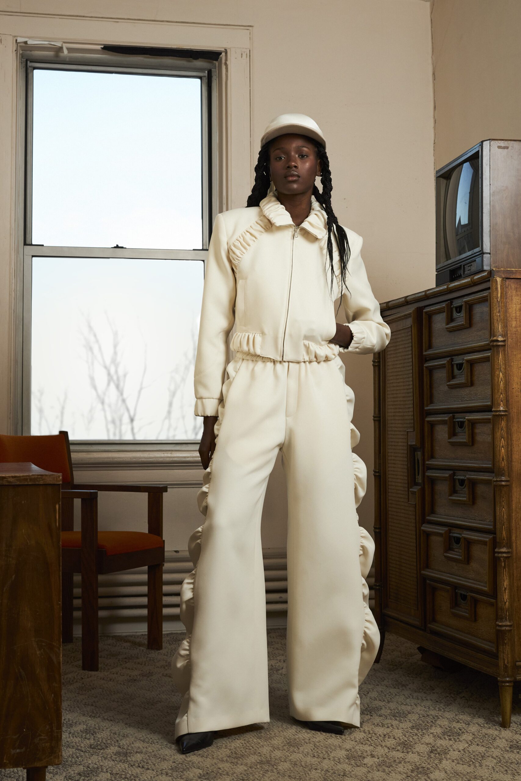 white silk fitted jacket and pants