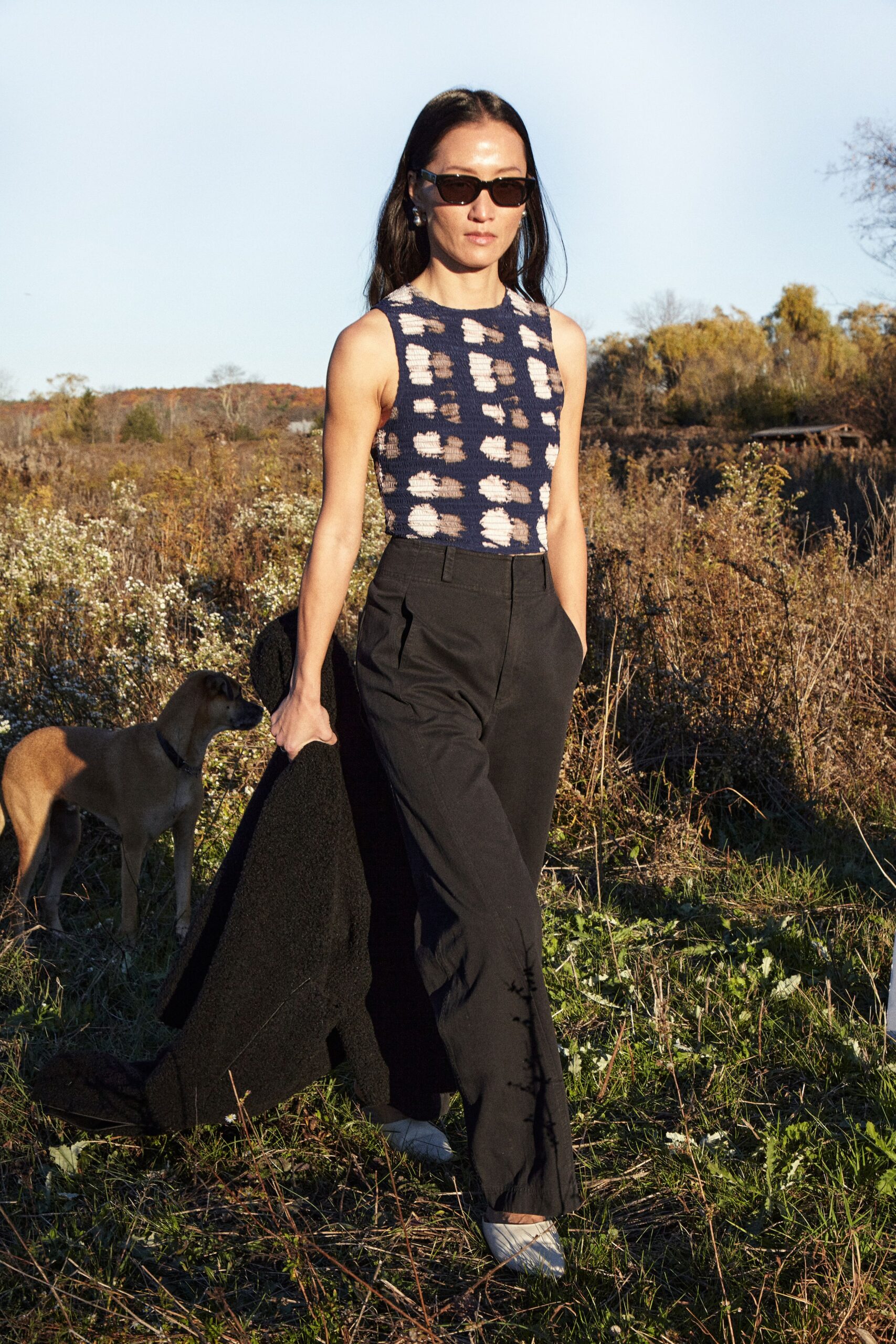 fitted black and white top with tailored pants