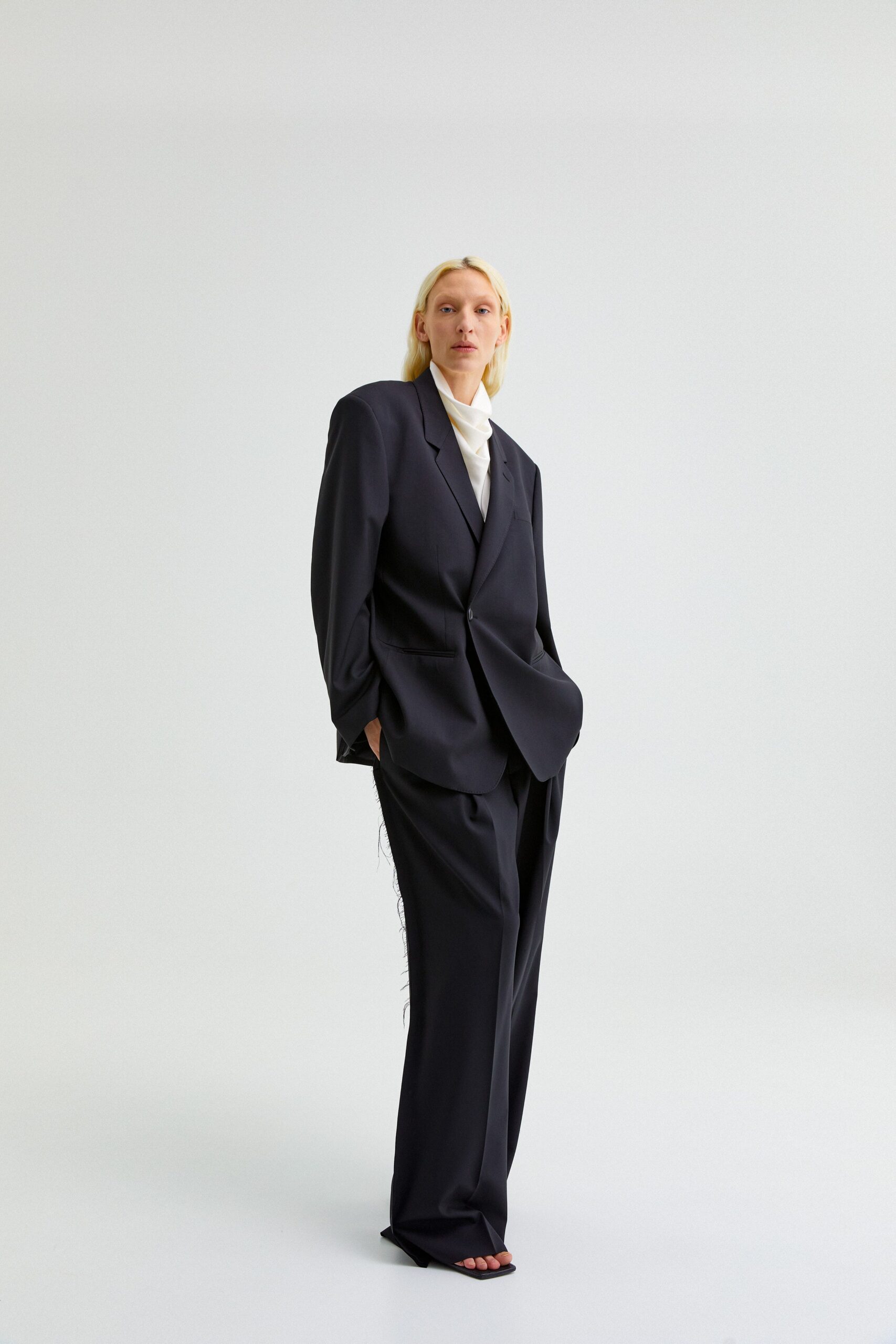 black wool long-sleeve collared oversized straight-leg suit