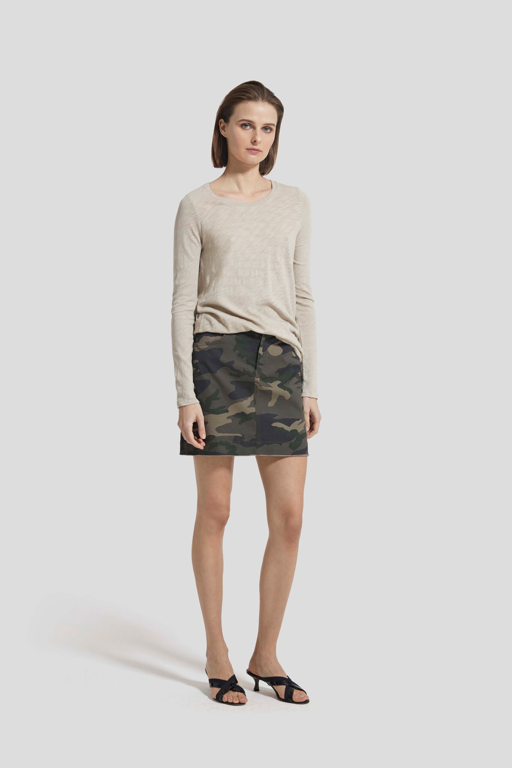 beige fitted top with camouflage skirt