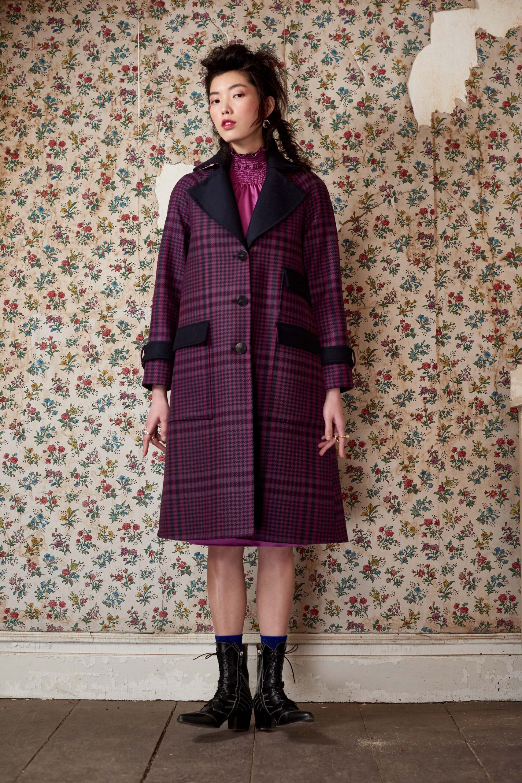 purple checked coat with pink blouse