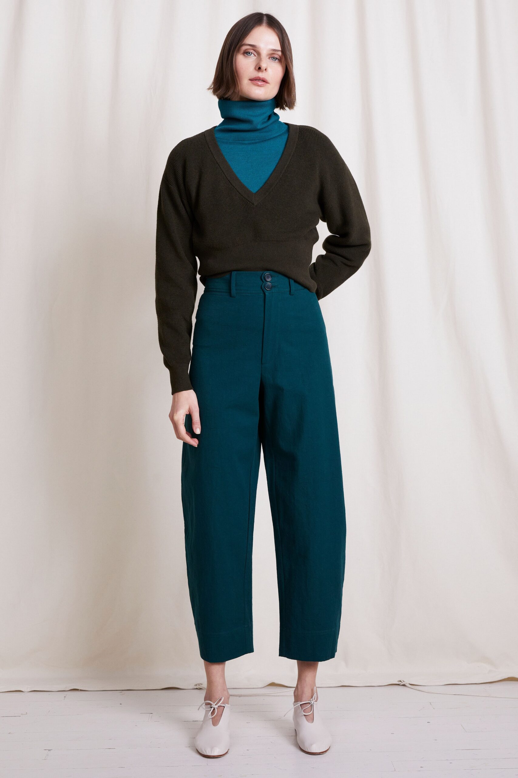 green wool long-sleeve v-neck relaxed sweater