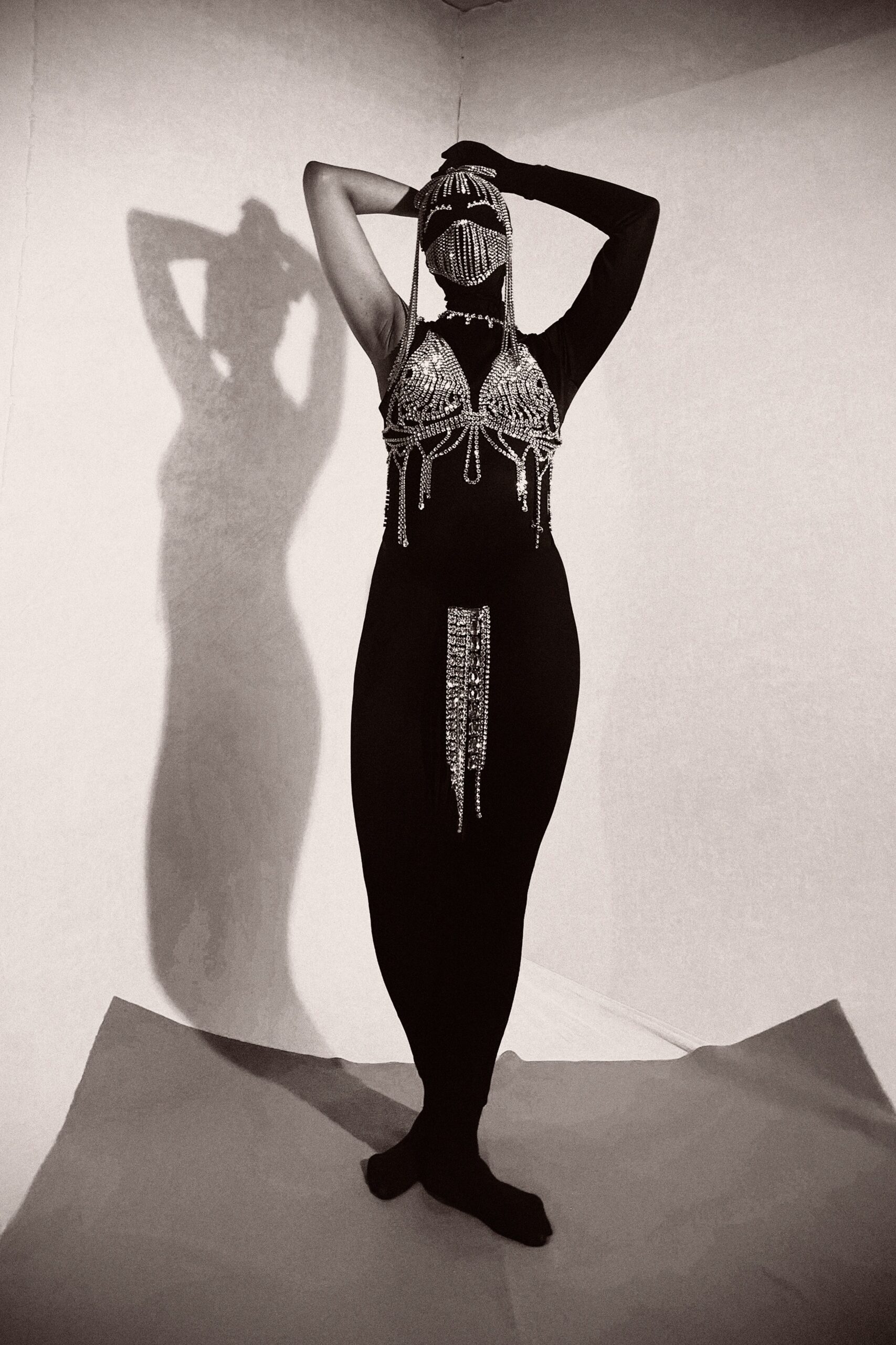 black fitted embellished catsuit