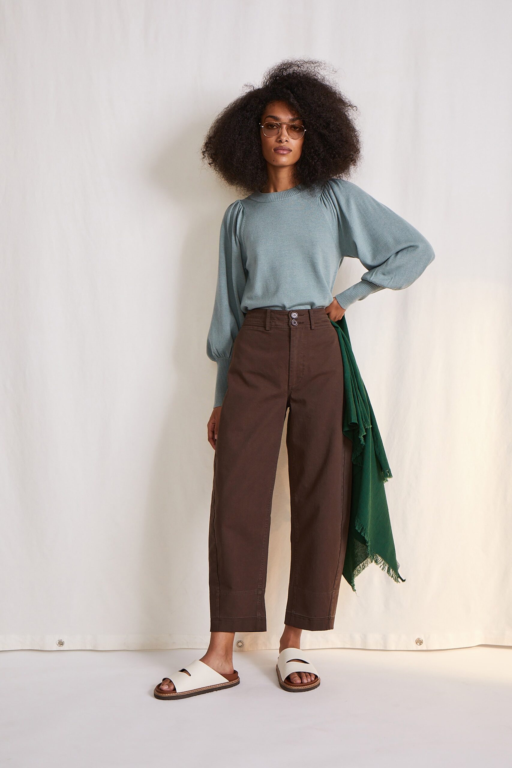 blue relaxed top with brown pants