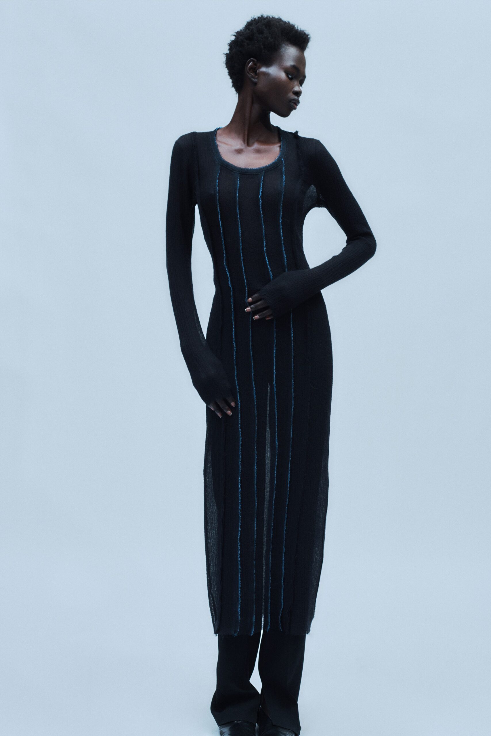 black knit maxi dress with fitted pants