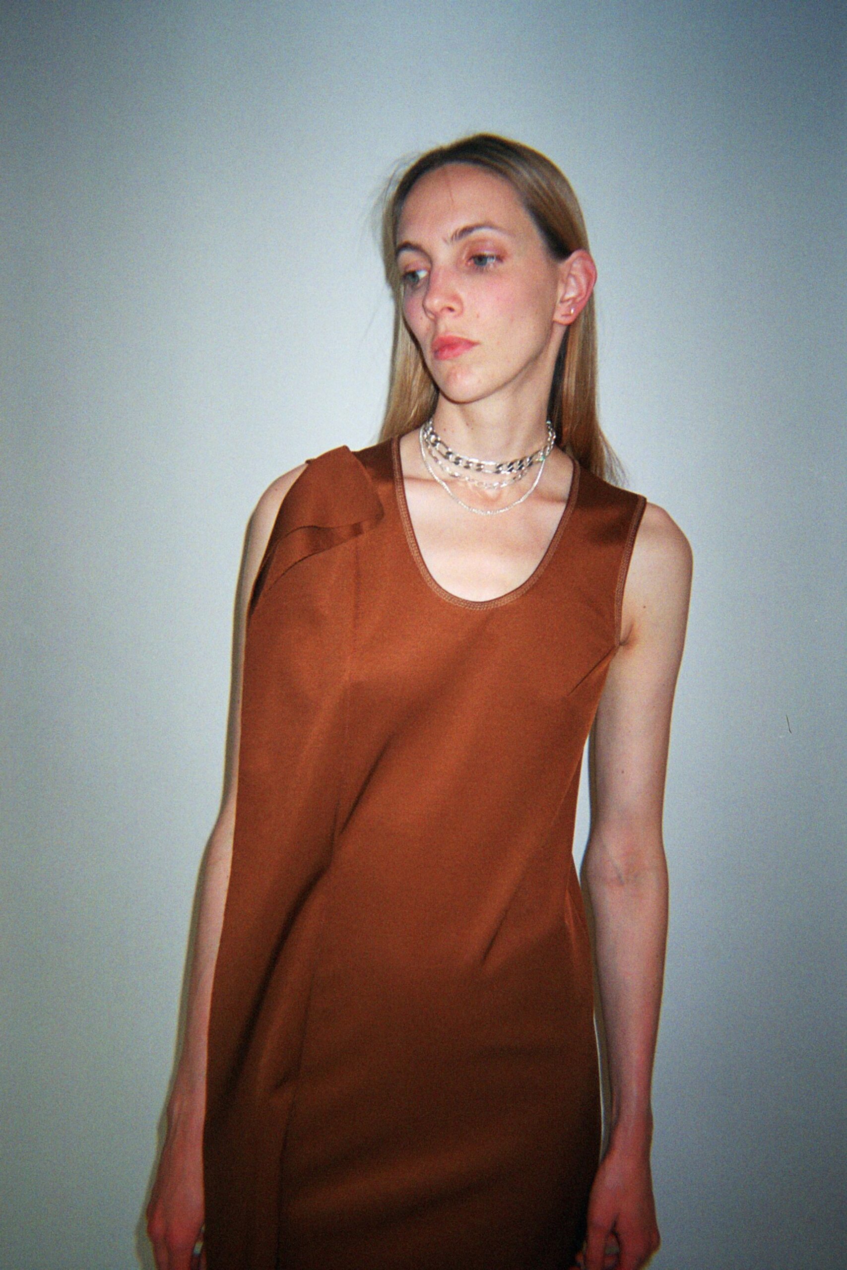 fitted brown sleeveless dress
