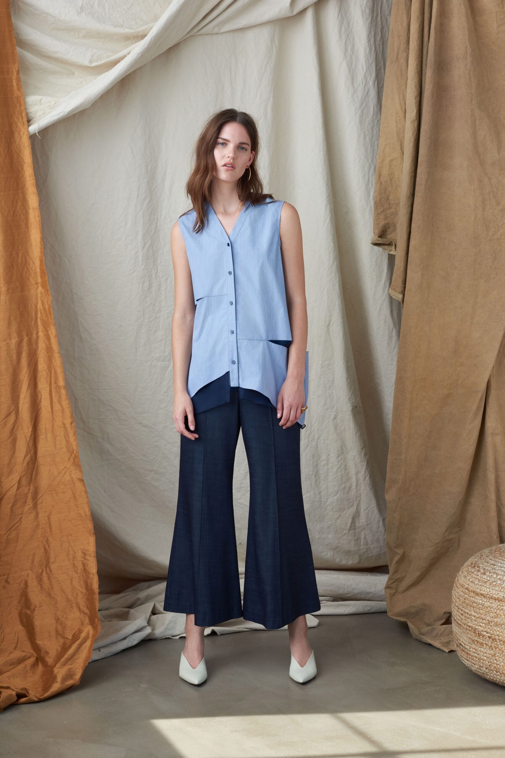 blue relaxed sleeveless top with navy wide-leg pants