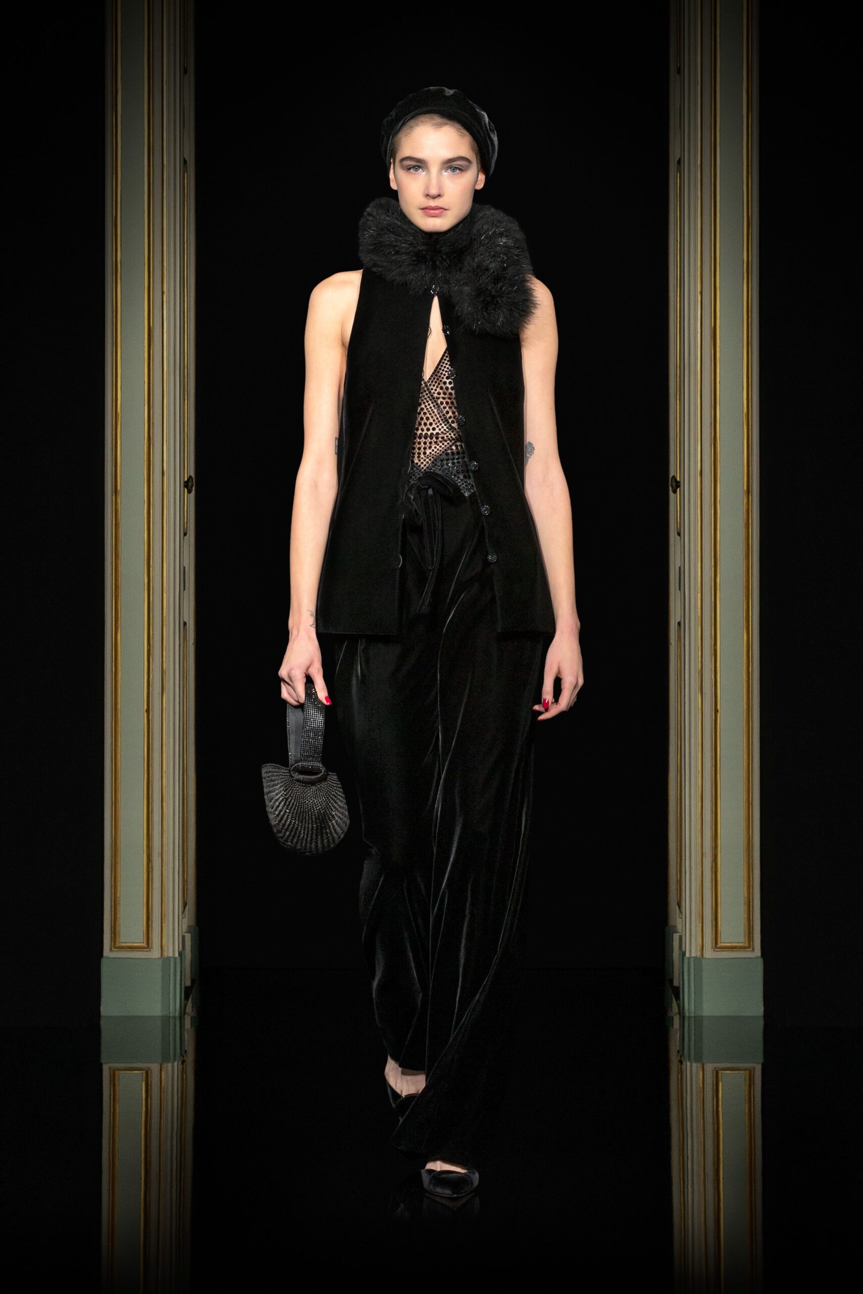 black velvet fitted vest and relaxed pants