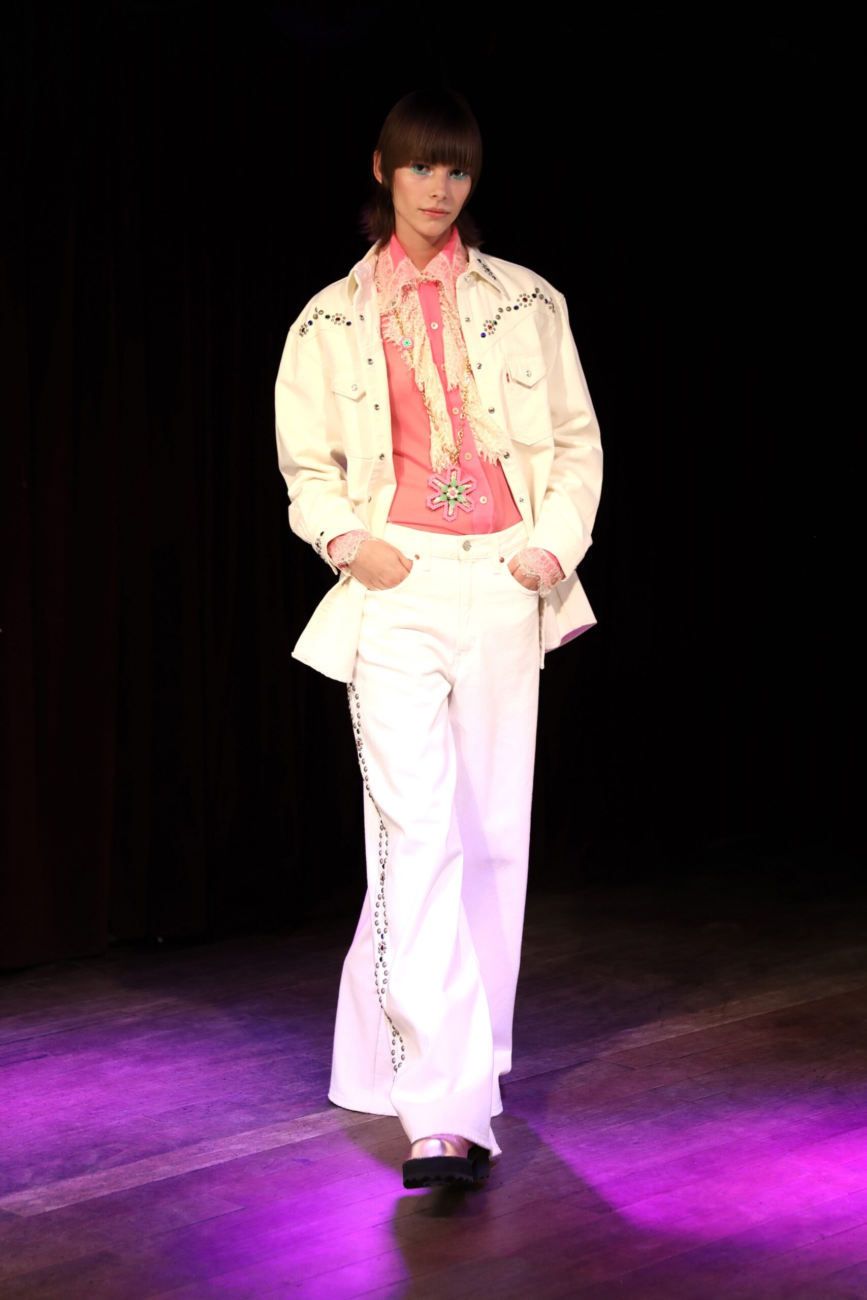 white jacket pink shirt wide-leg pants