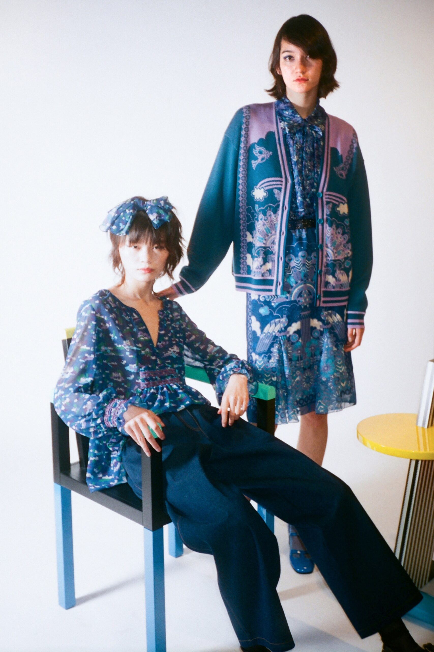 blue floral blouse and denim pants