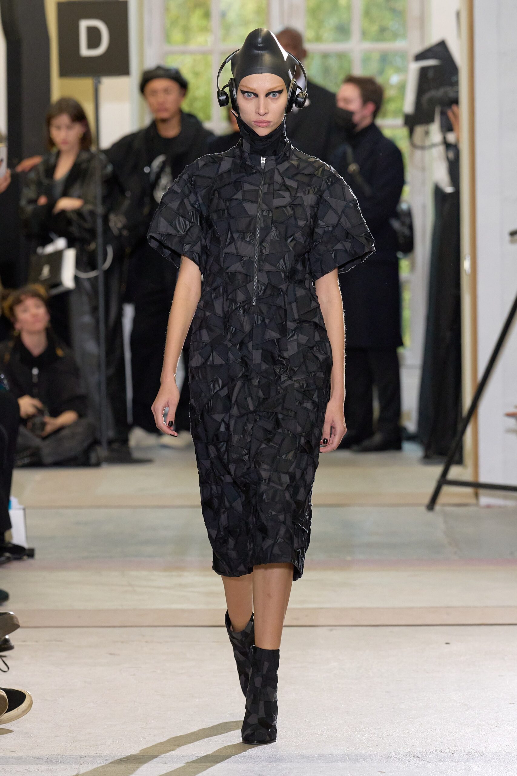 black fitted pleated dress