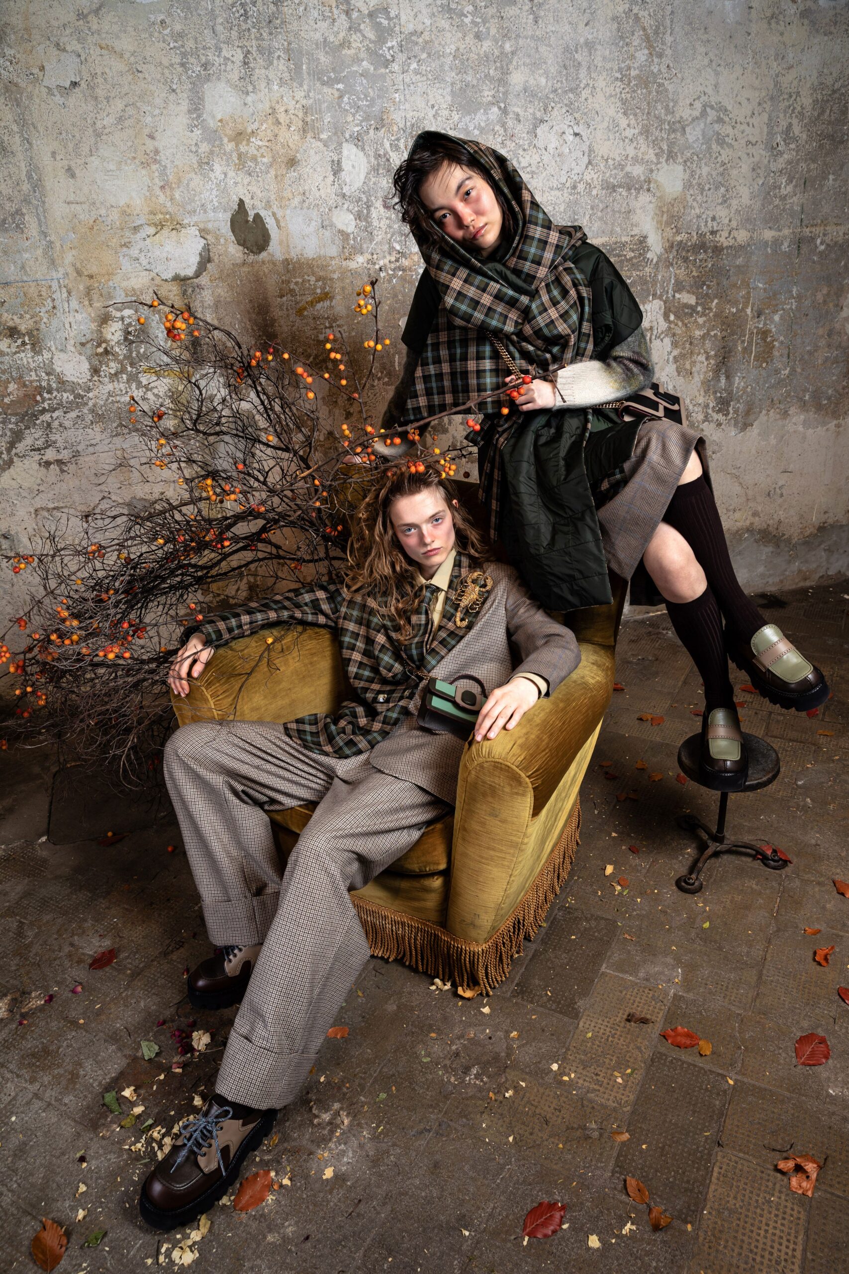 gray tailored suit with pleated skirt