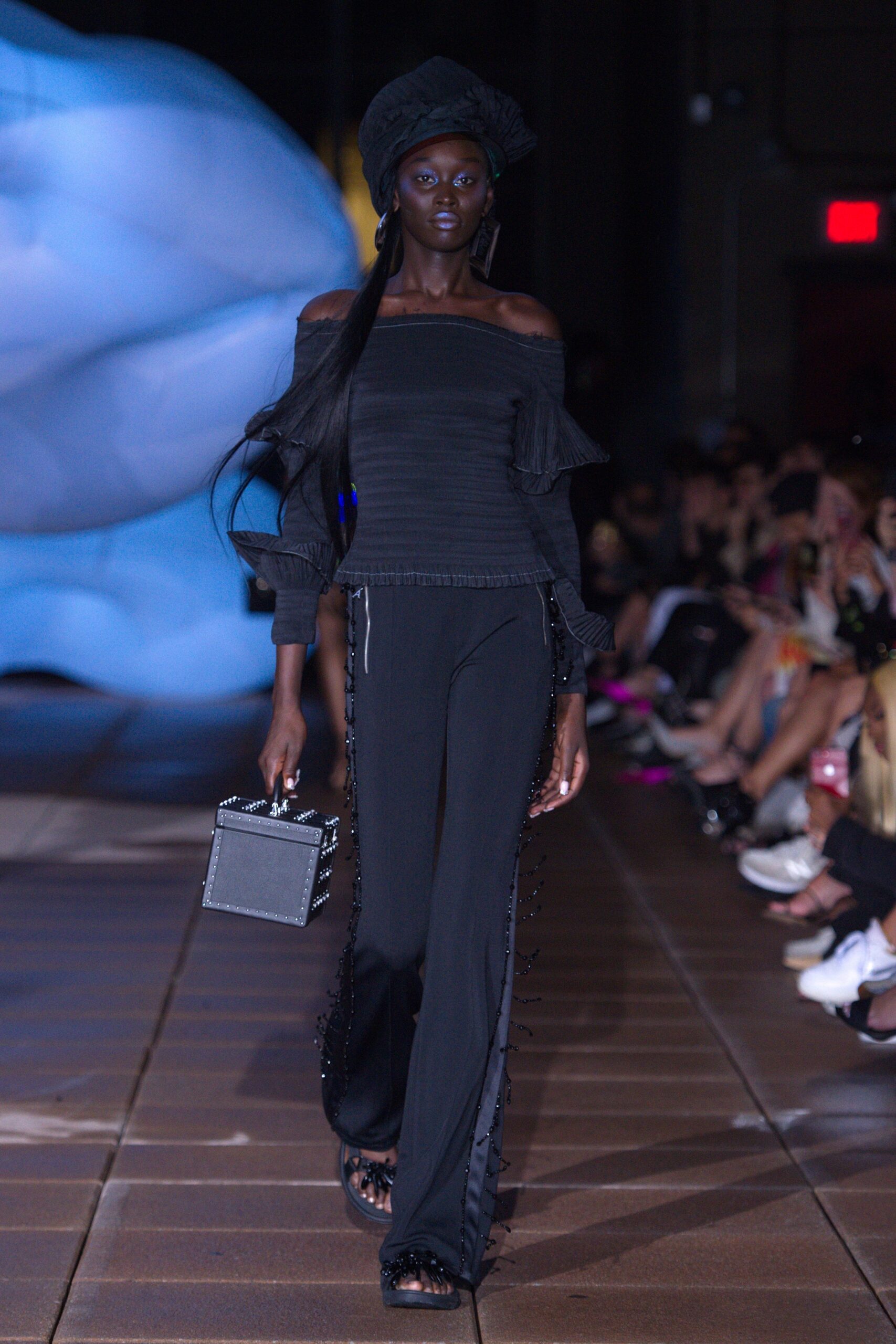 black fitted off-shoulder top and pants