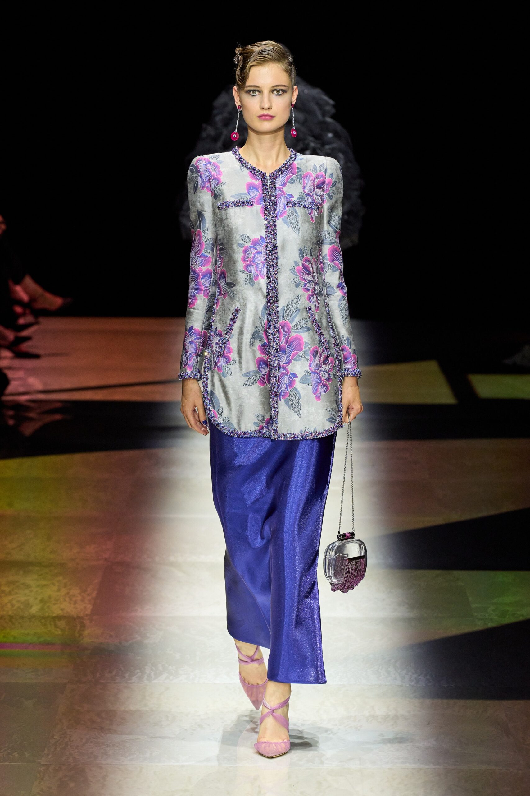 embroidered gray blouse with blue skirt