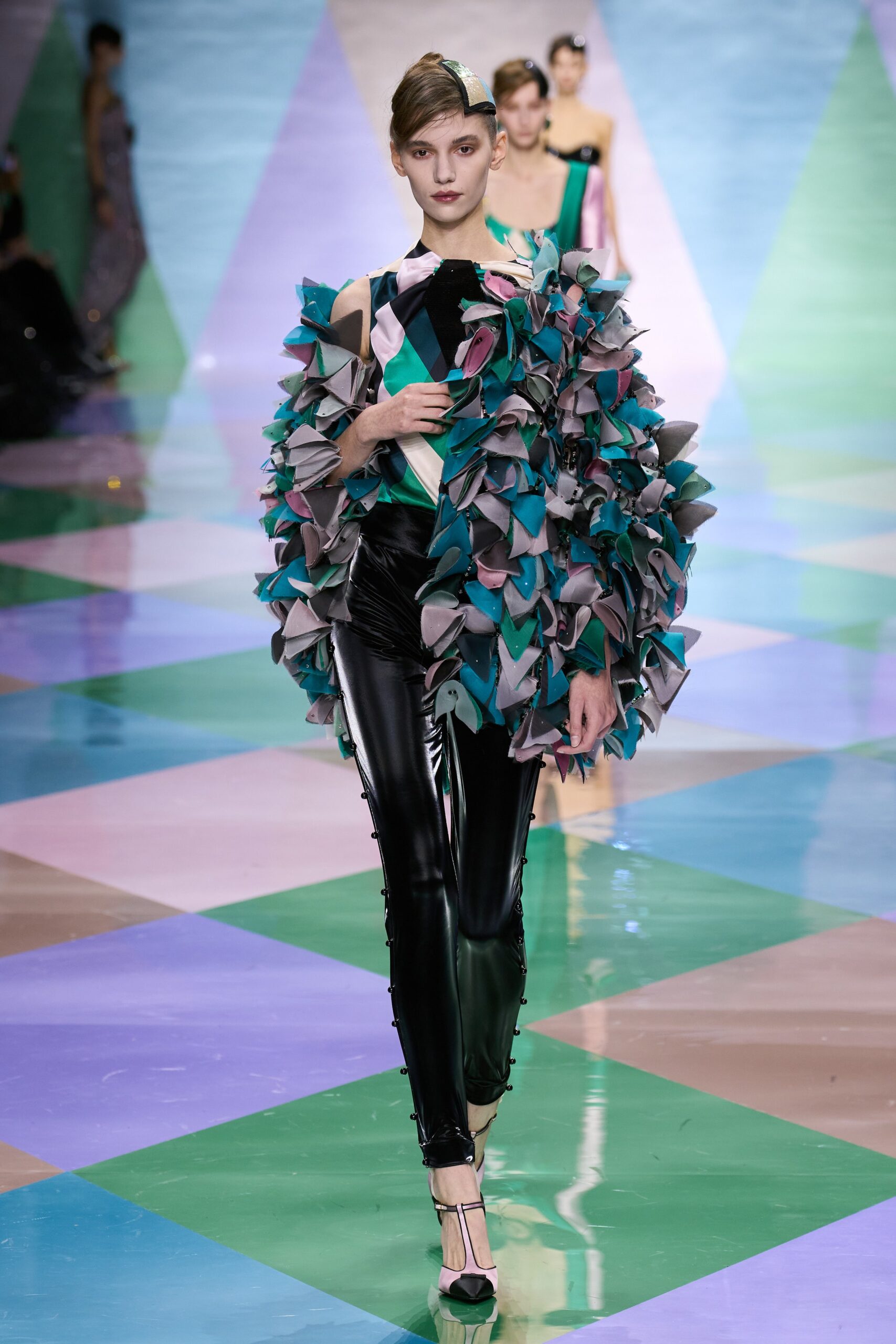 layered silk jacket with leather pants