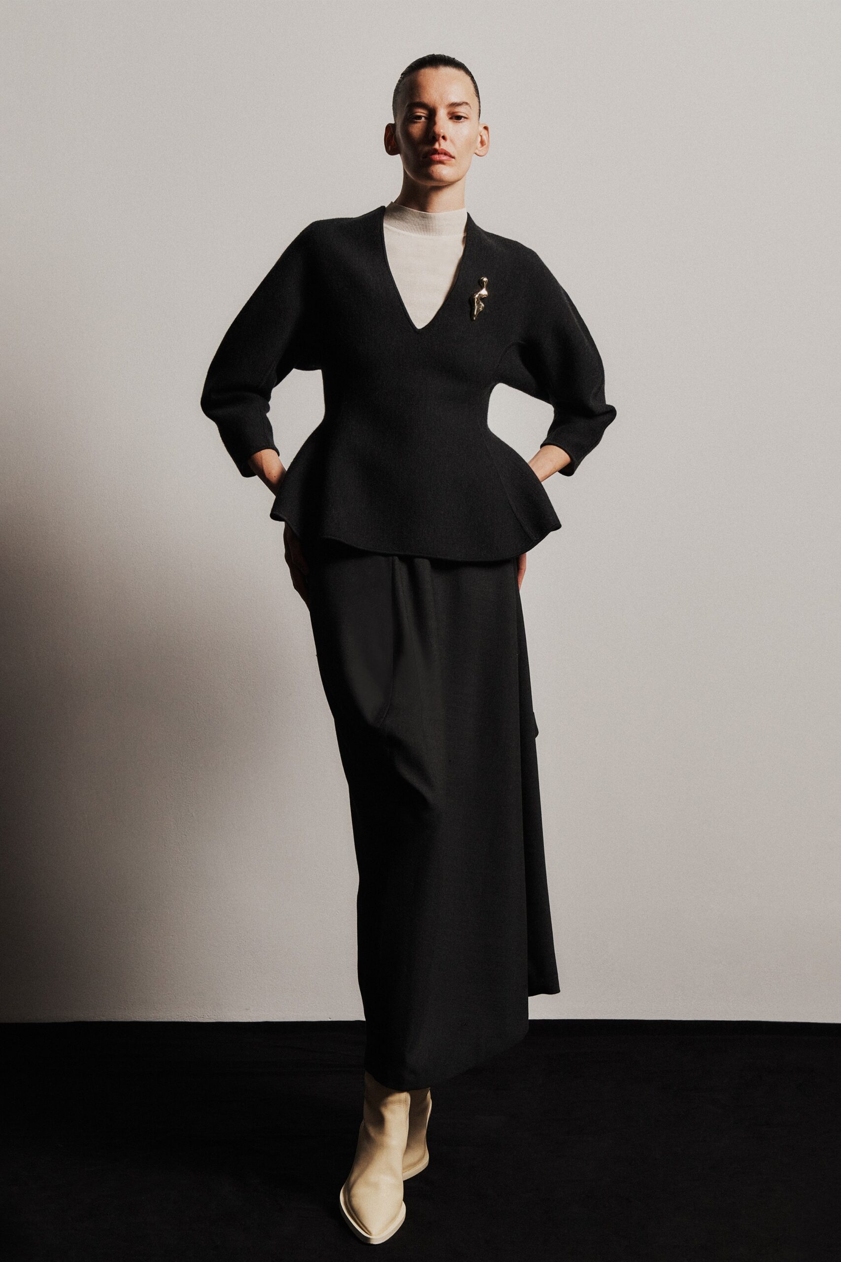 black wool long-sleeve v-neck fitted flared top
