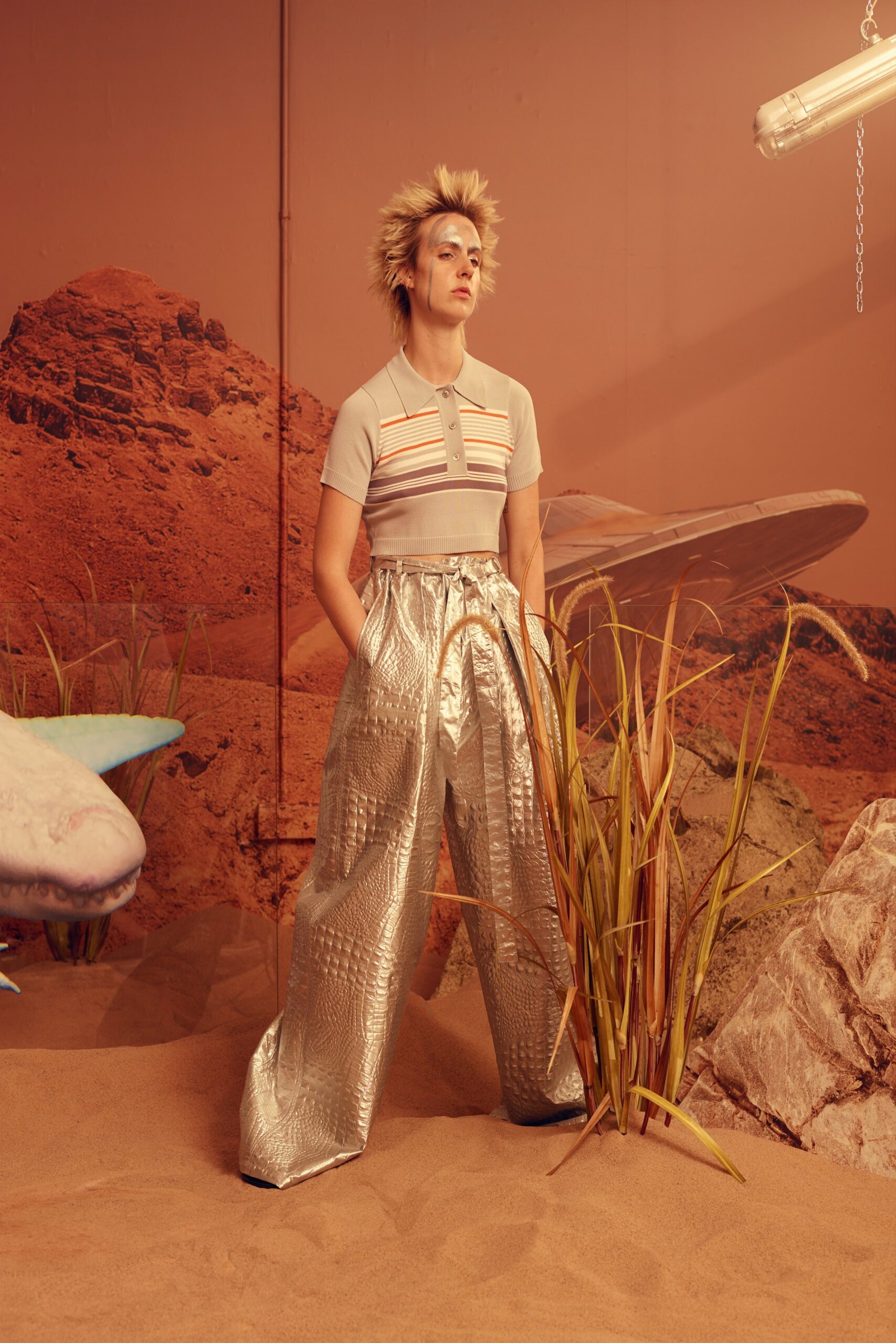 gray striped fitted top with silver pants