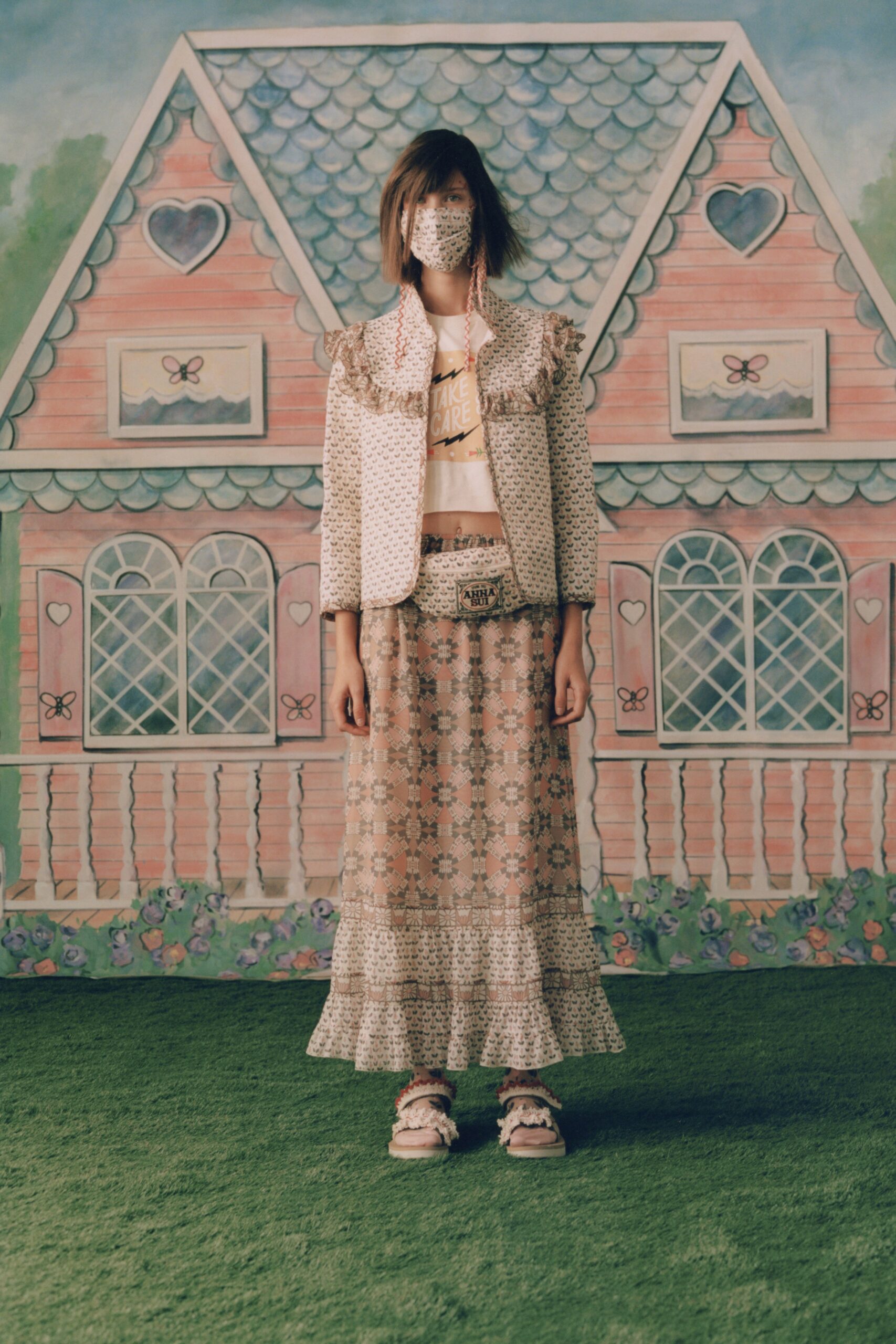 white embroidered jacket with beige skirt