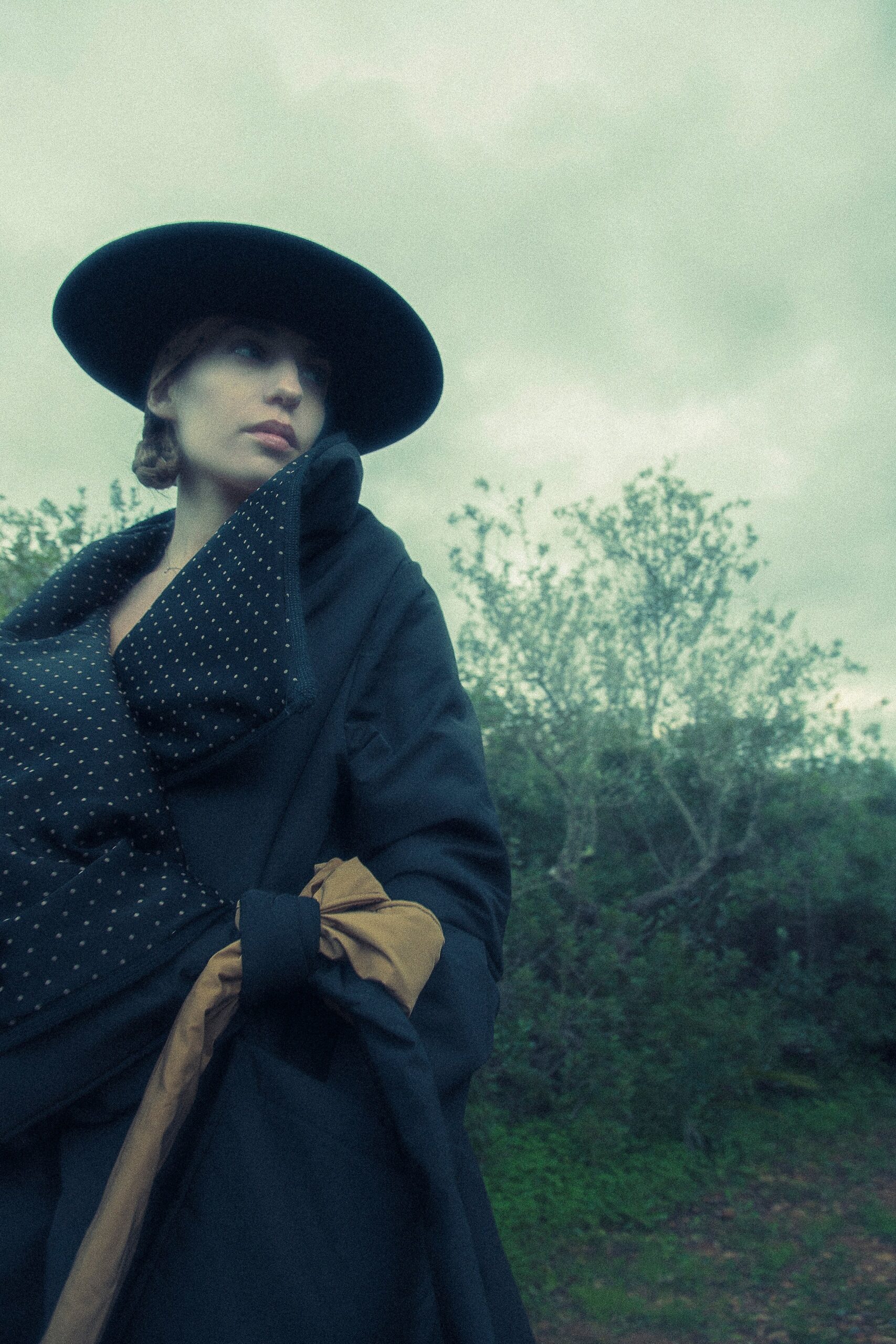 black cotton long-sleeve collared relaxed draped coat
