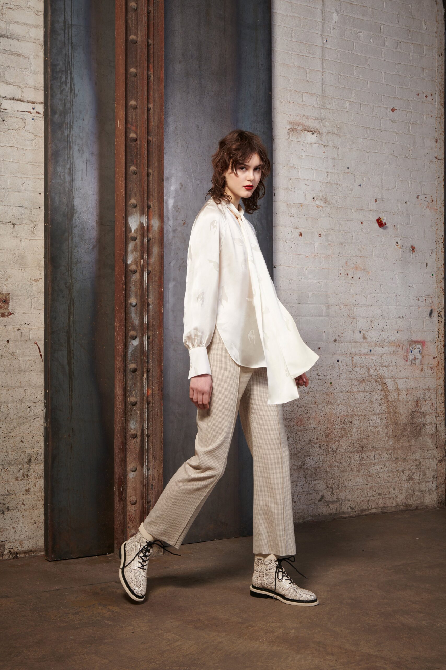 white silk shirt with beige tailored pants