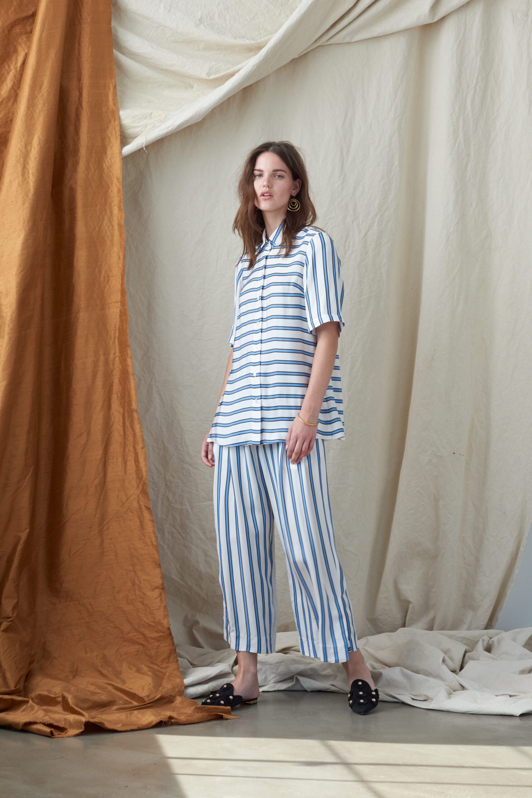 striped white and blue shirt and pants