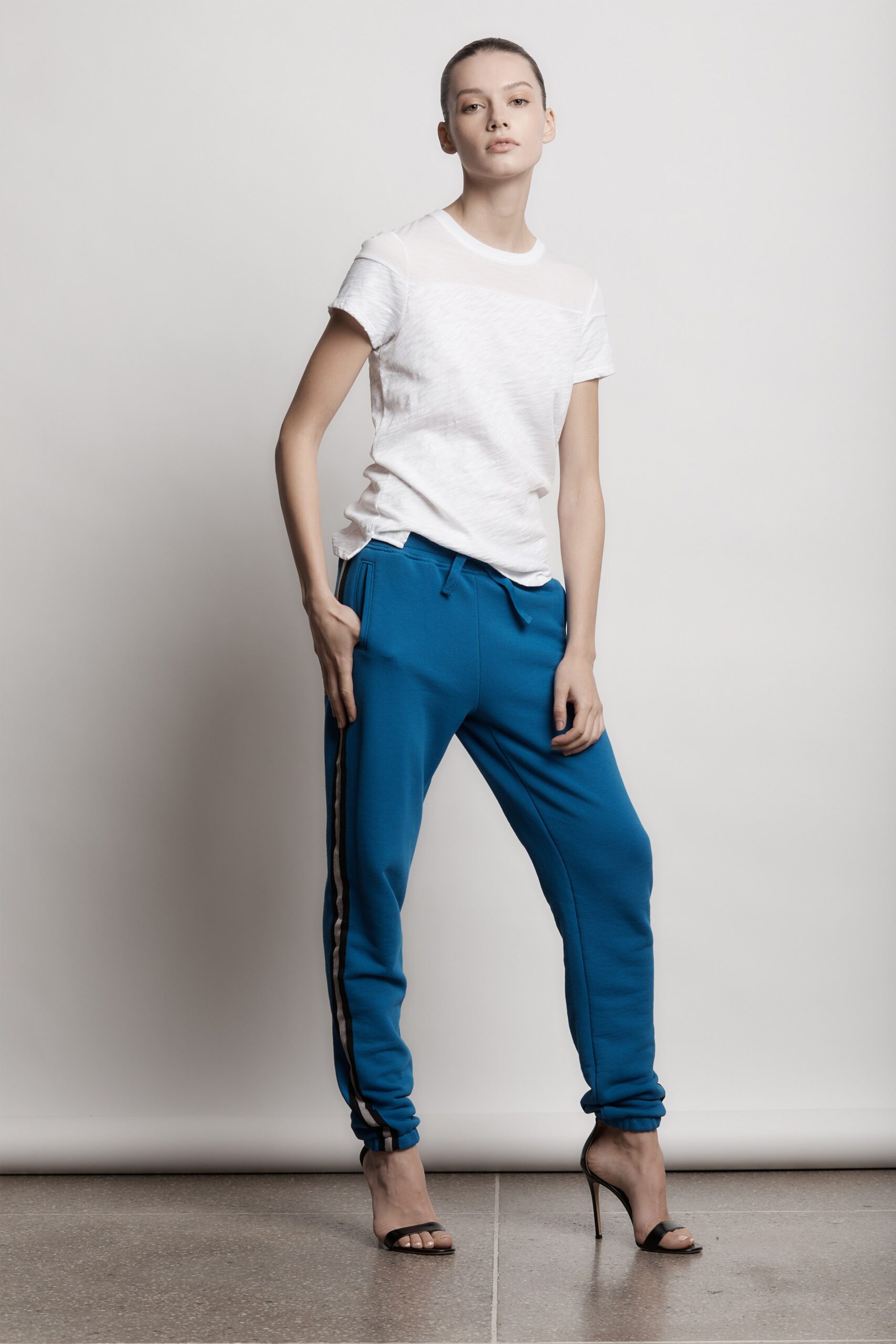white t-shirt blue pants