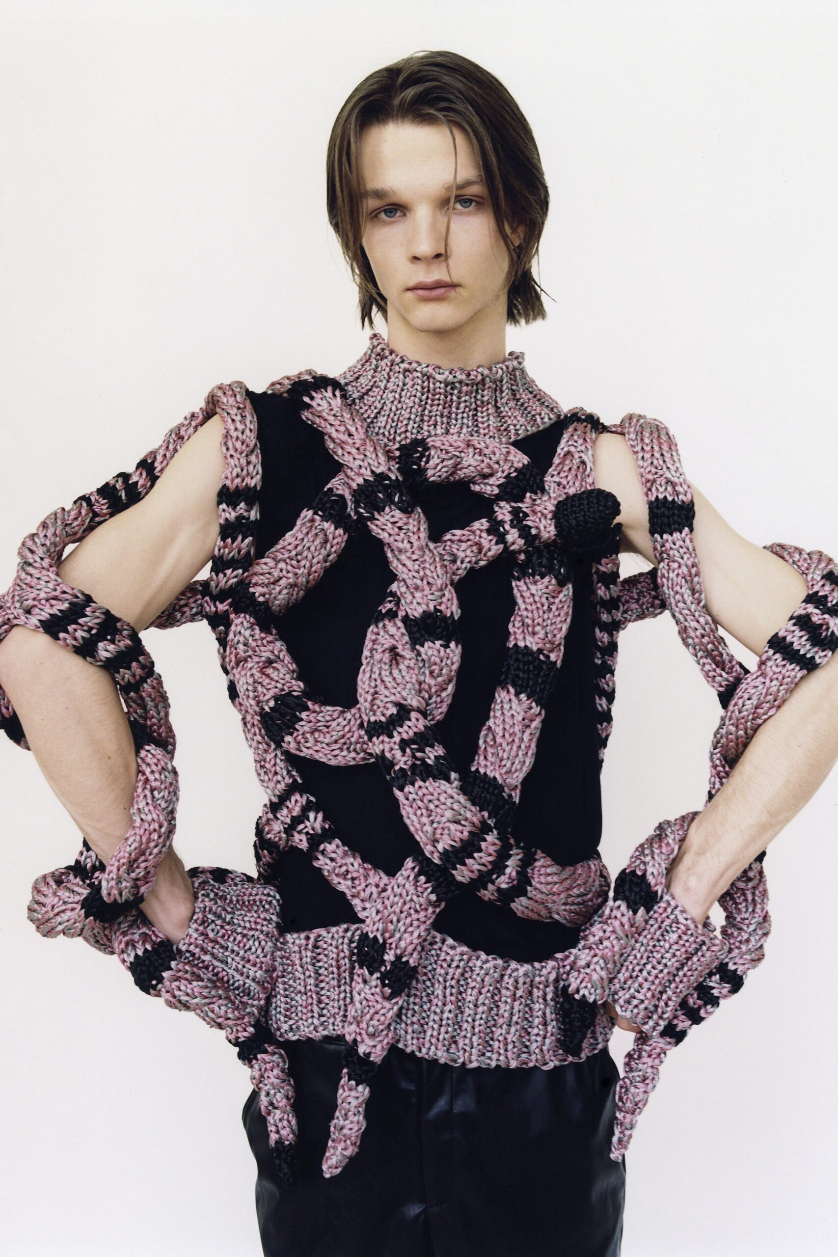 black leather fitted pants with knitted top