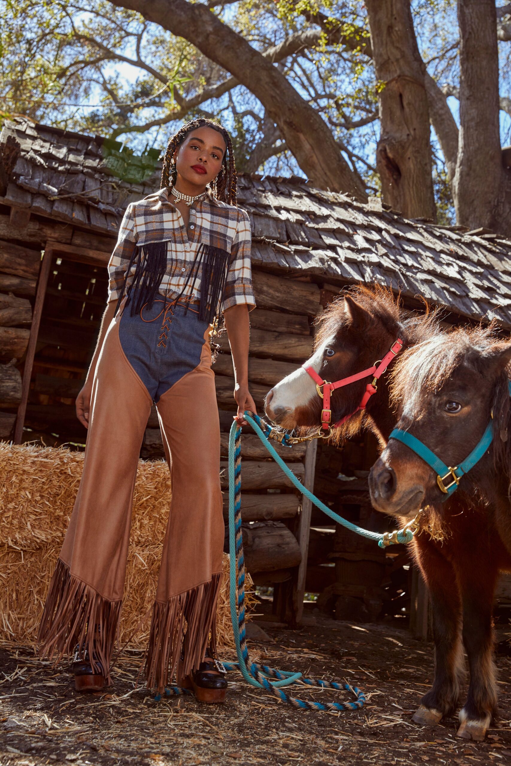 brown denim fitted flared fringed pants