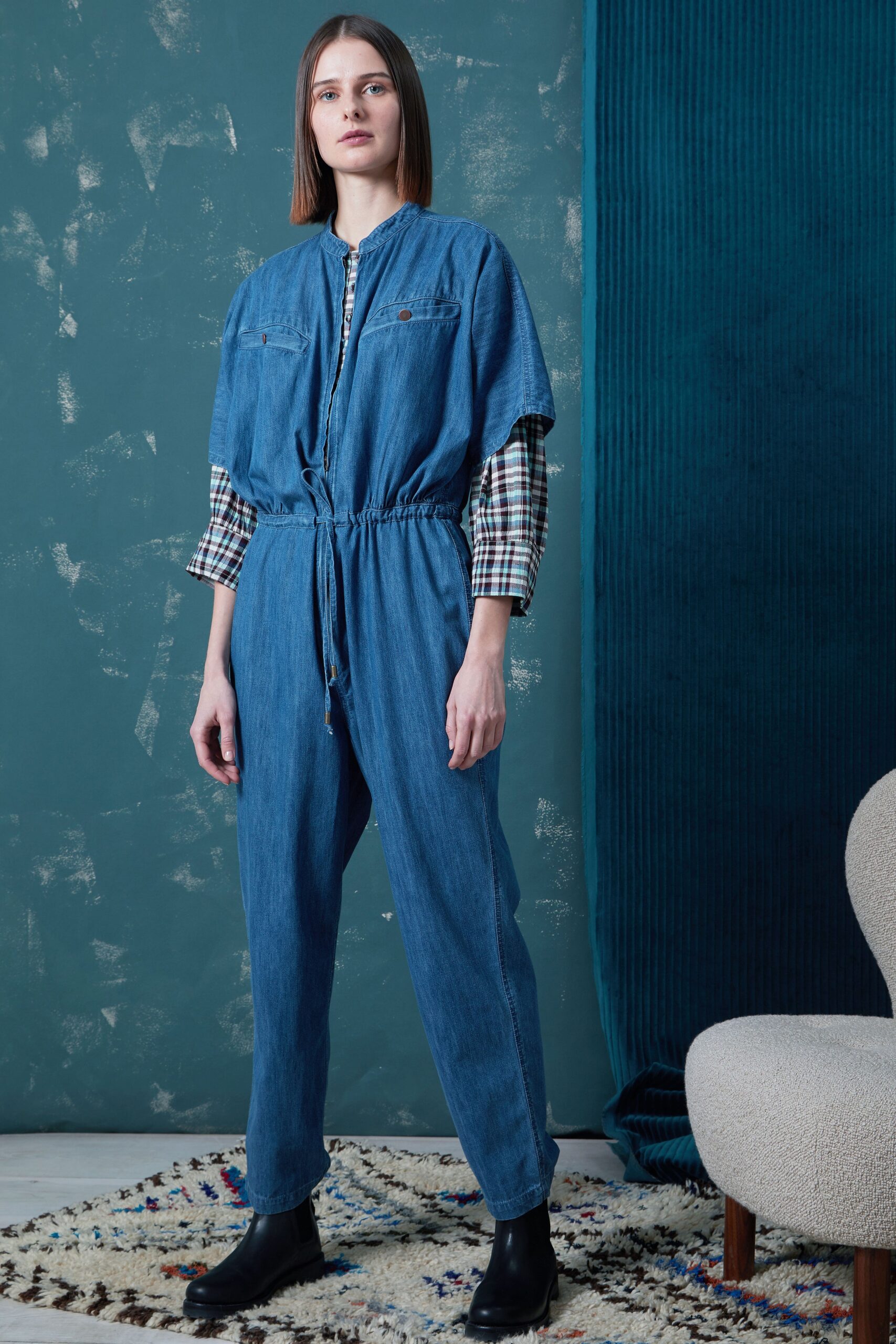 blue denim jumpsuit with checked shirt