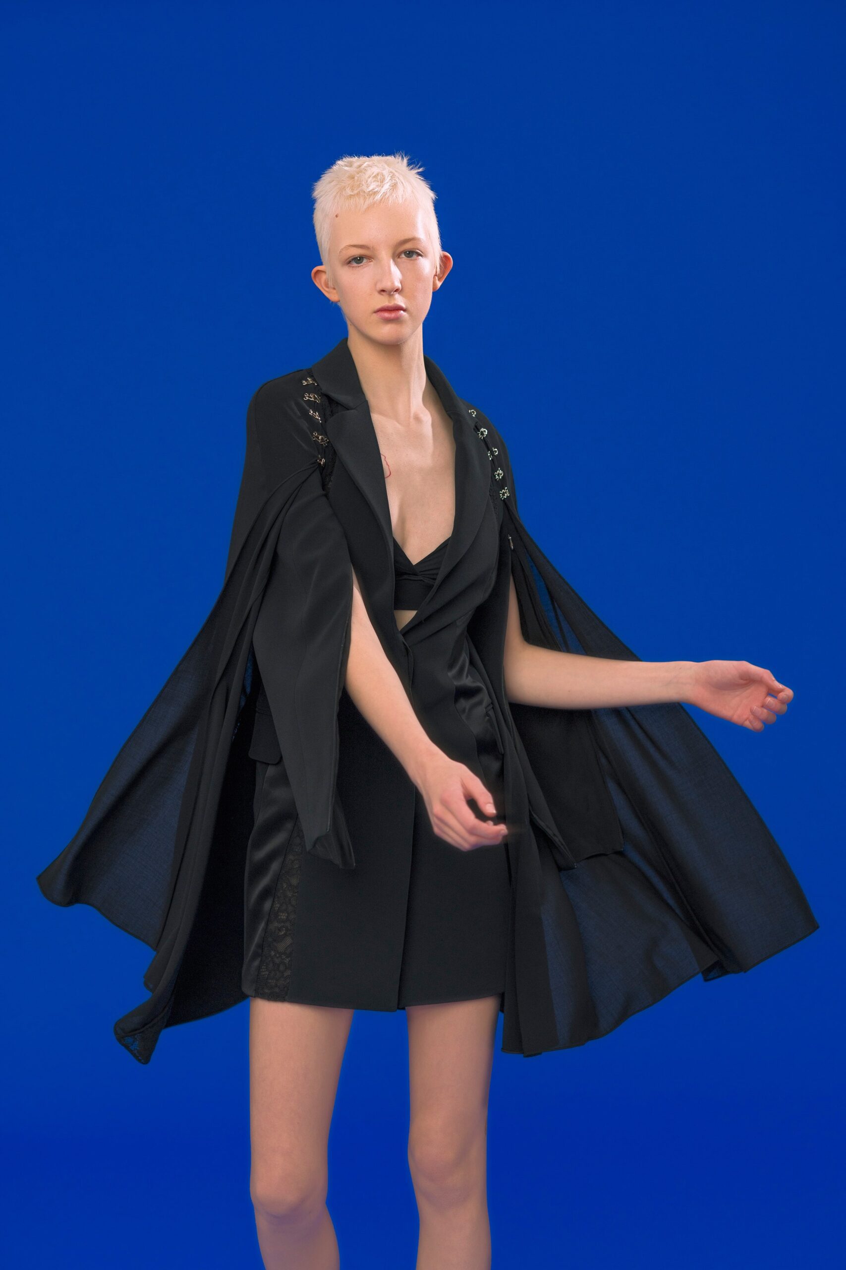 black fitted blazer and mini skirt