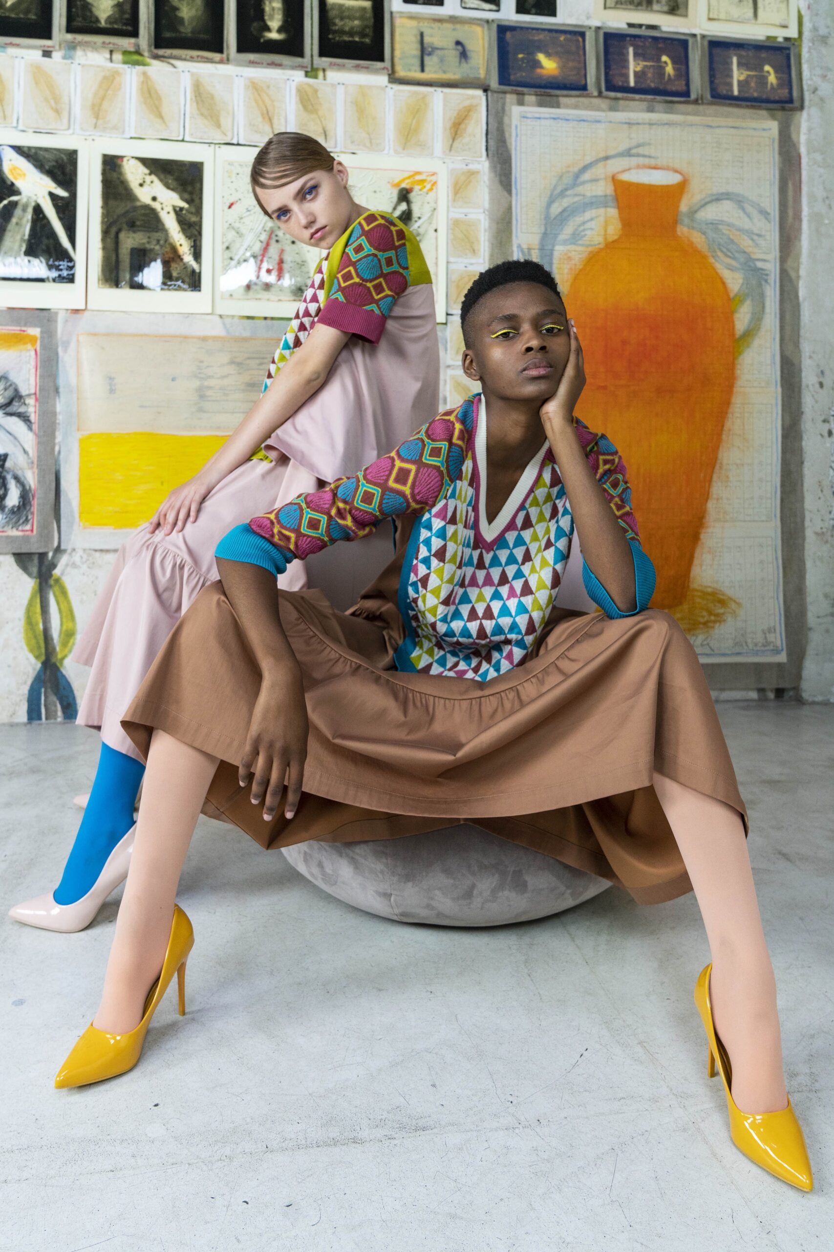 multi-colored top with pleated skirt