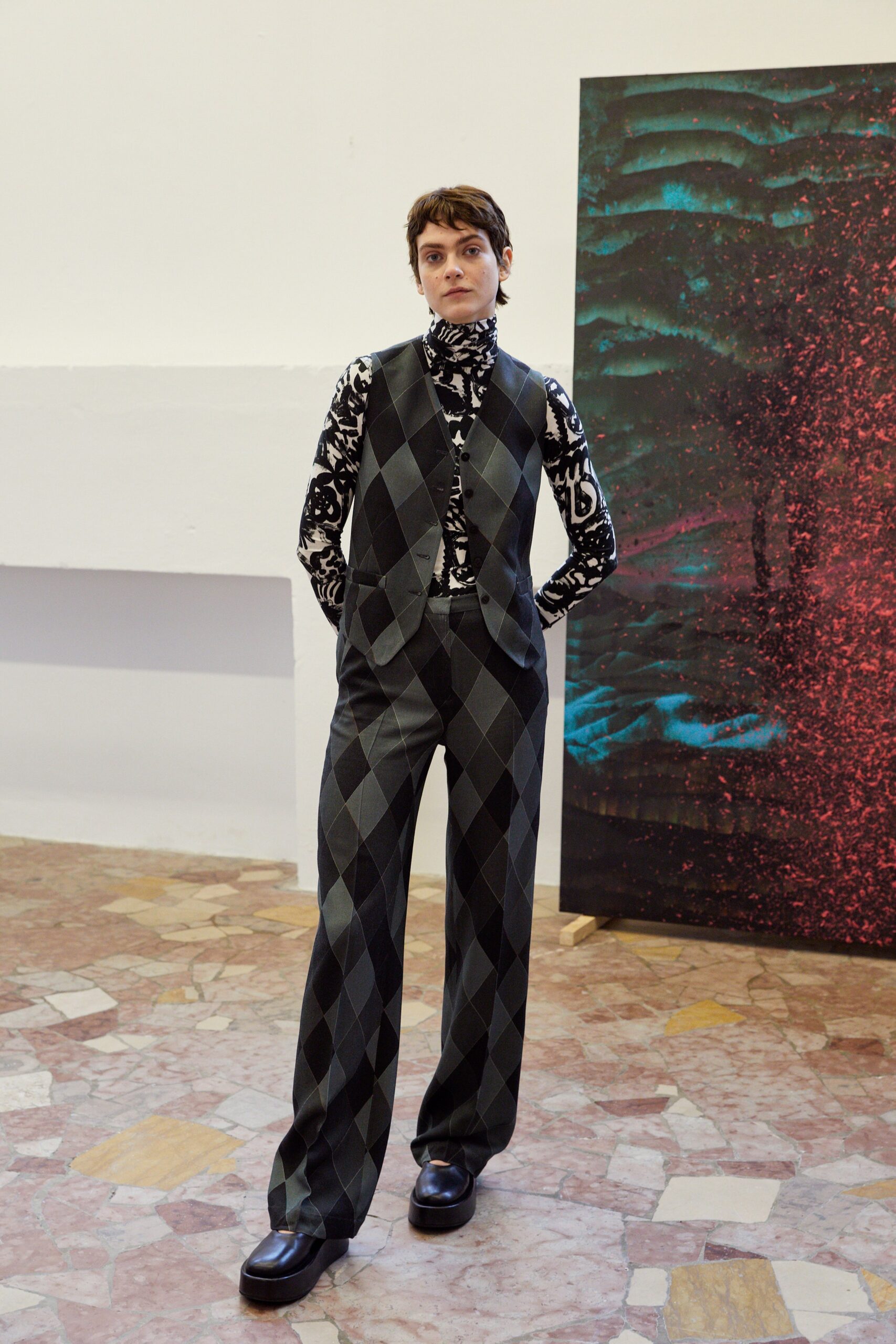 black and gray checked vest and printed top