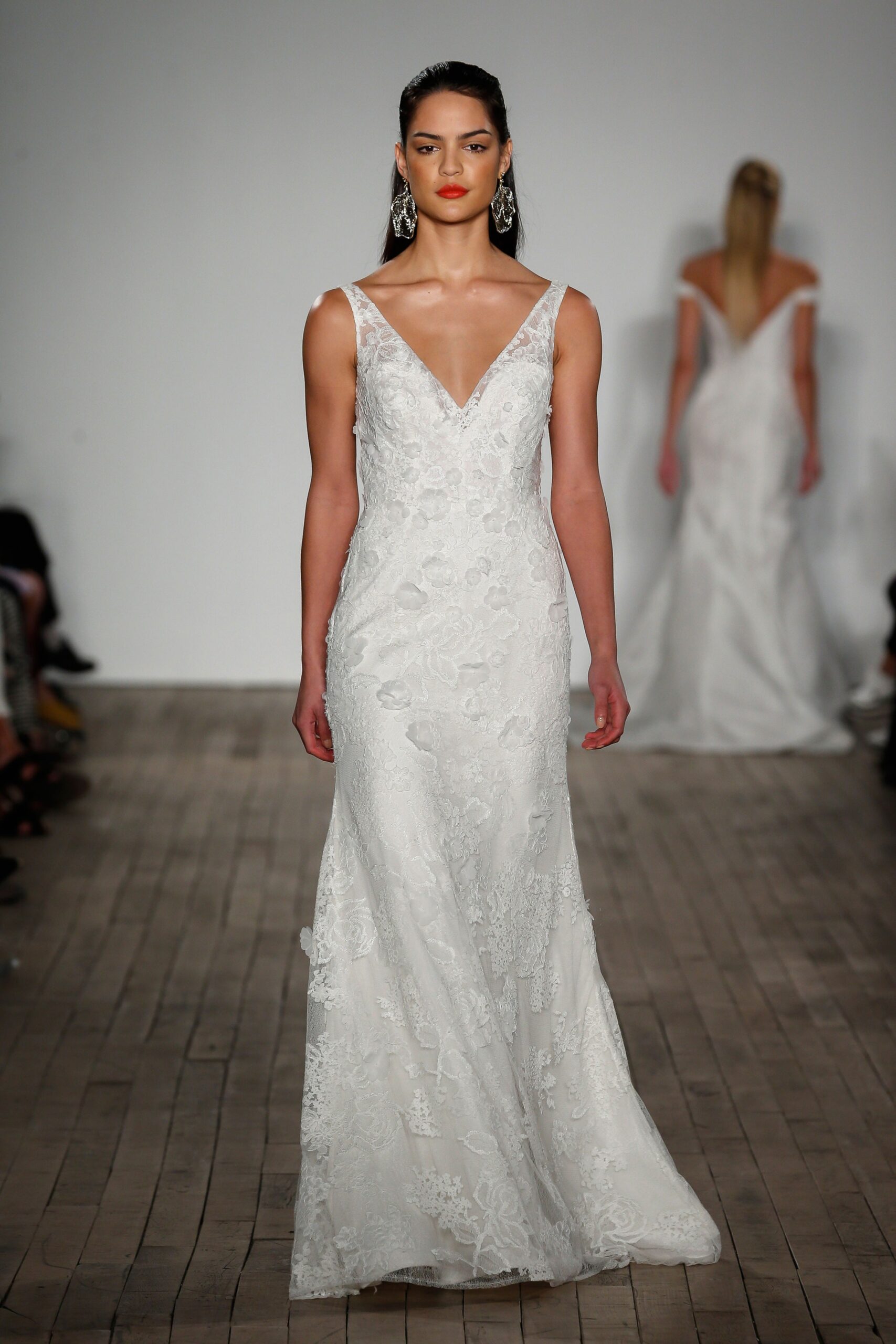 white silk embroidered gown