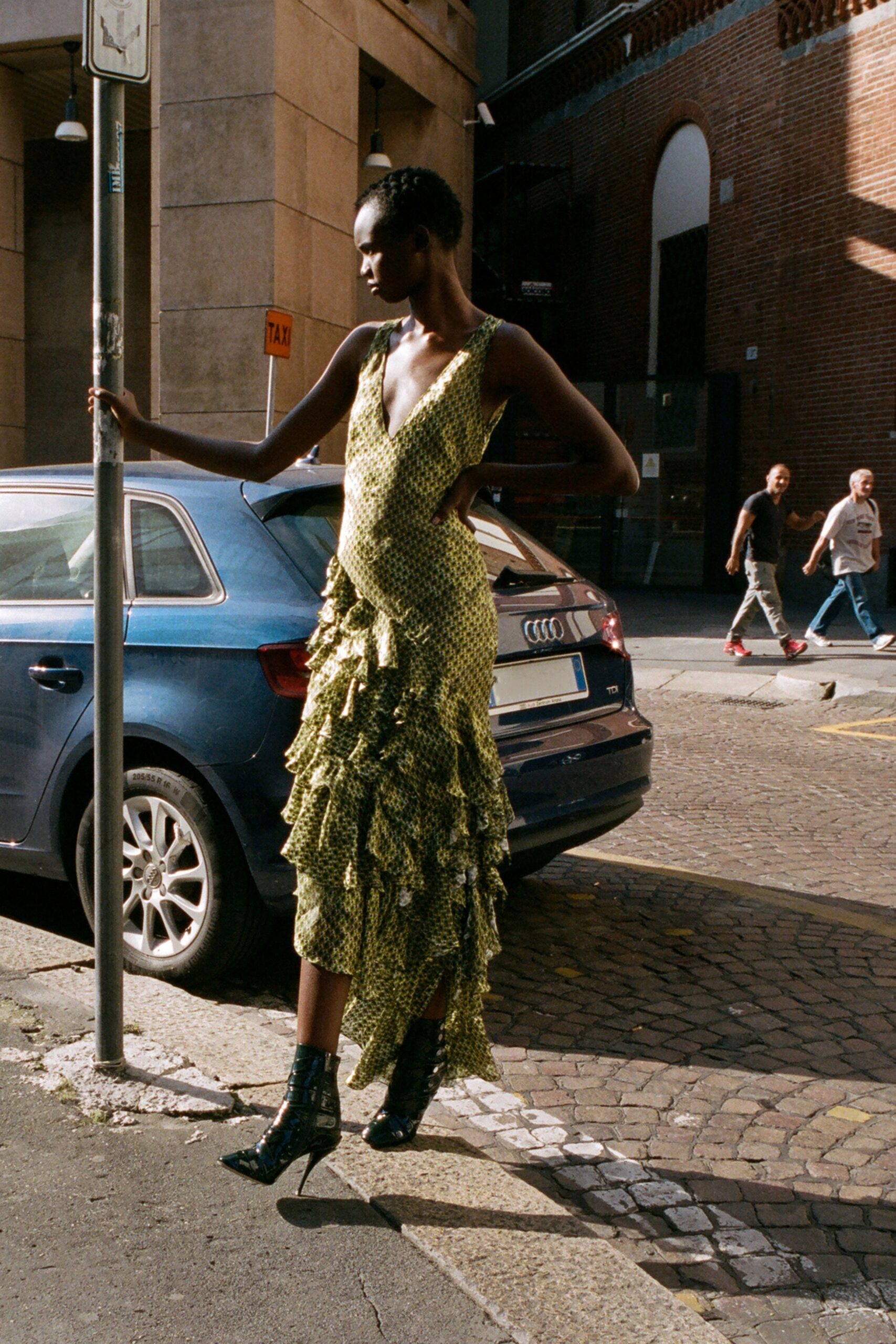 green silk sleeveless ruffled dress