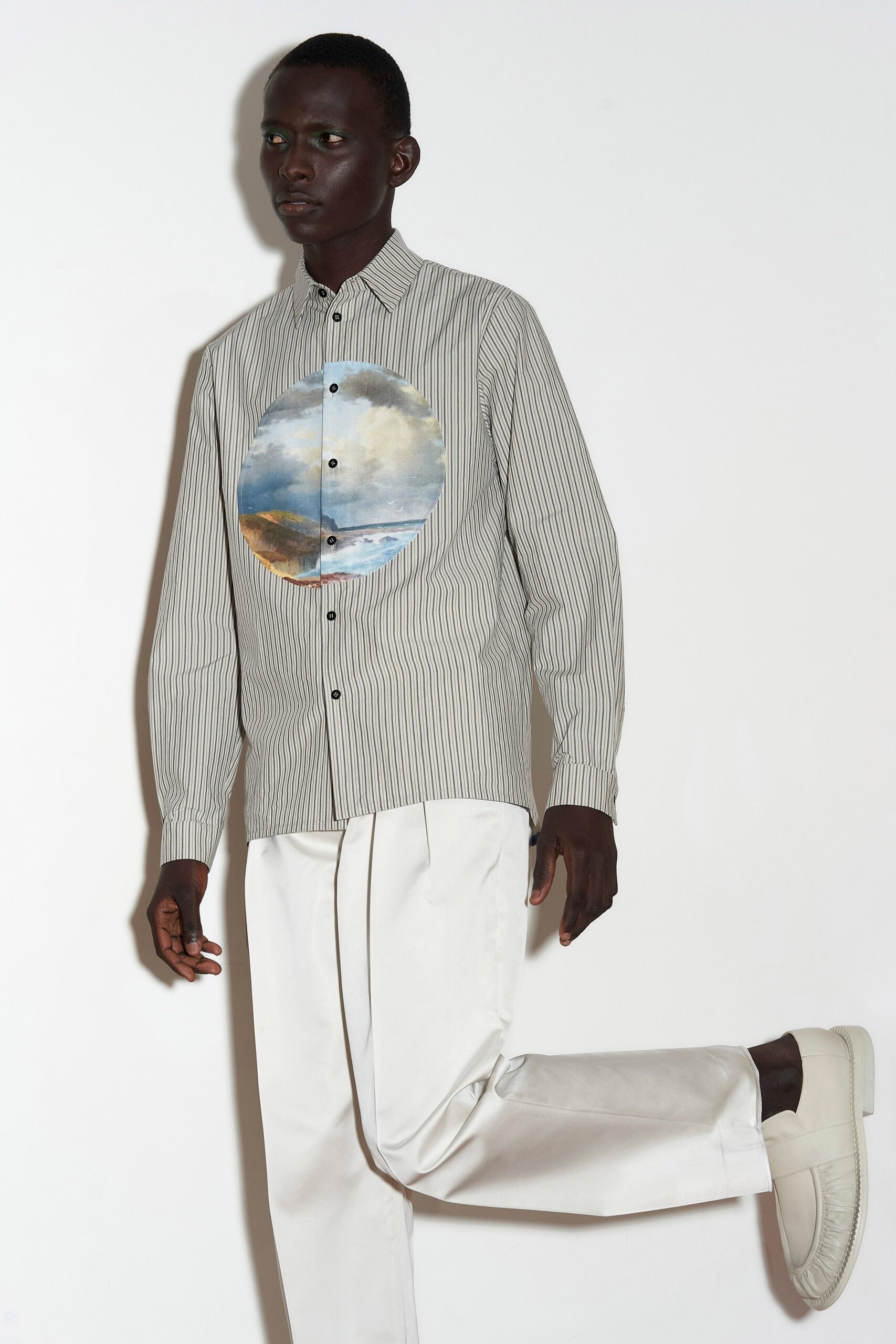relaxed striped shirt and tailored pants