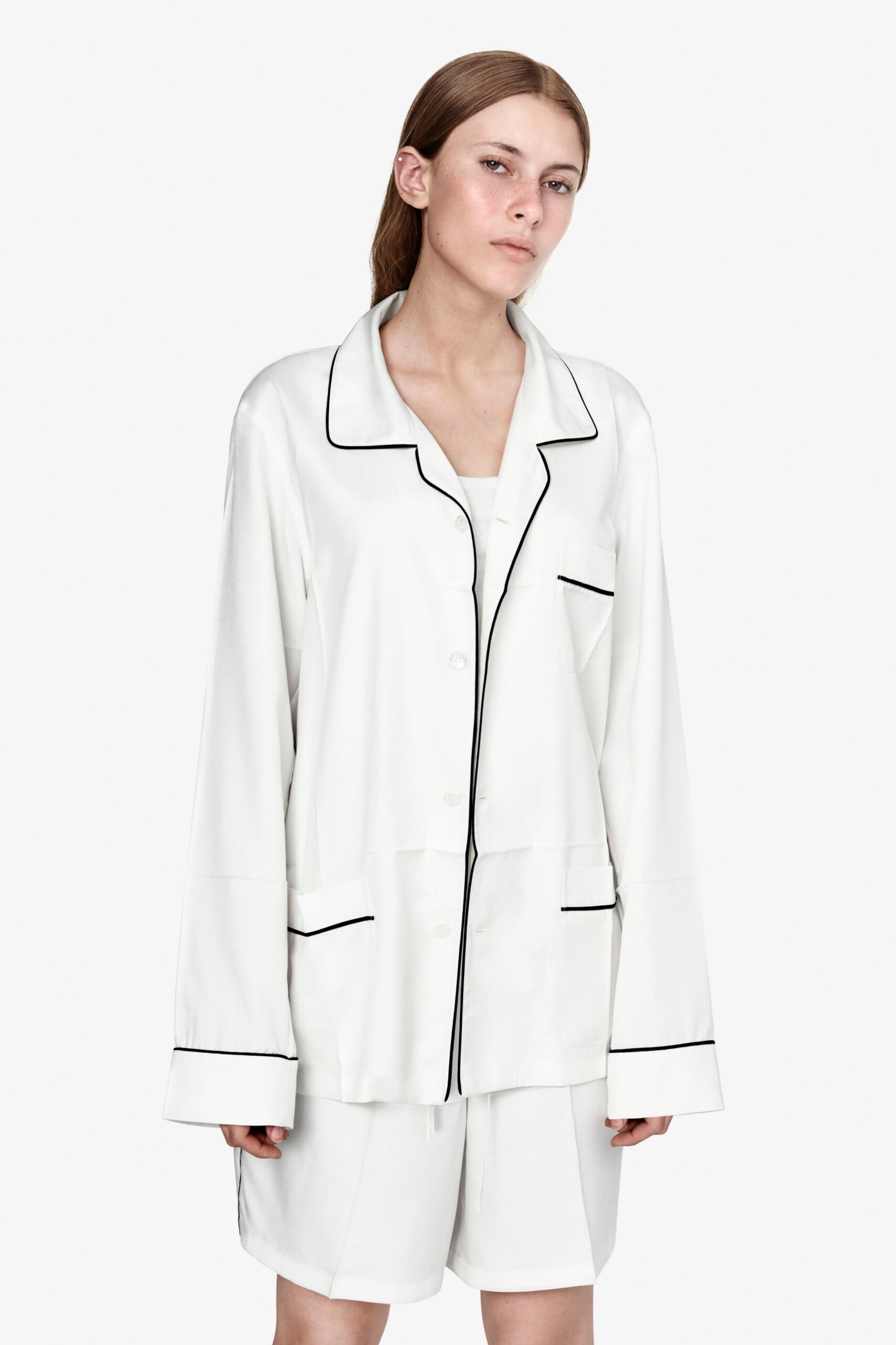 white silk long-sleeve collared relaxed buttoned pockets jacket