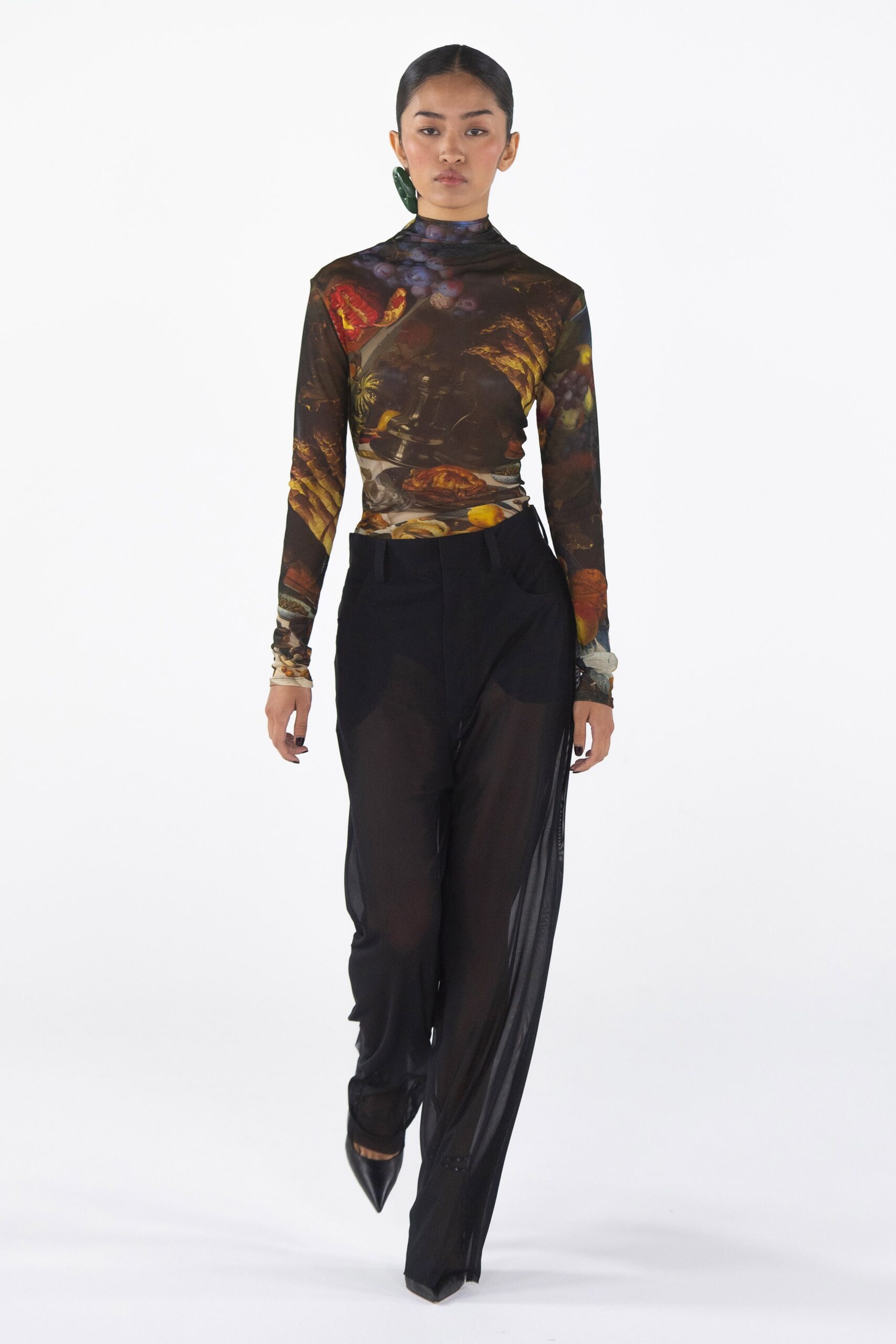 fitted sheer brown top and black pants