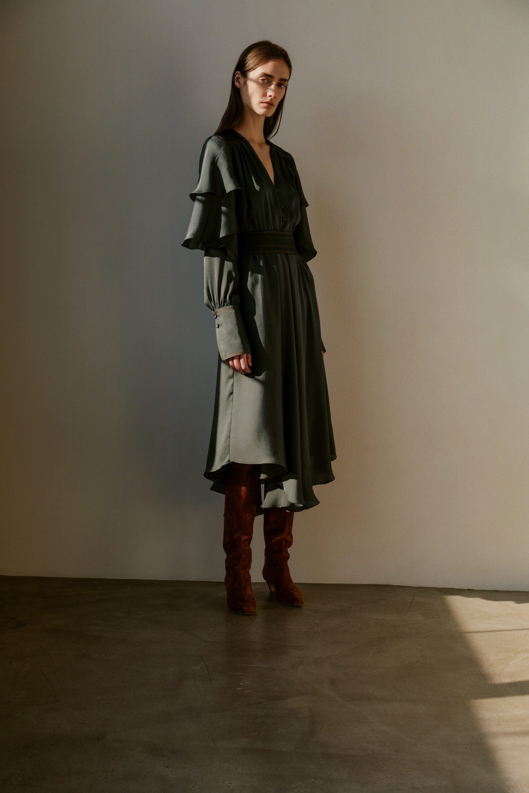 green silk long-sleeve v-neck fitted ruffled tiered dress