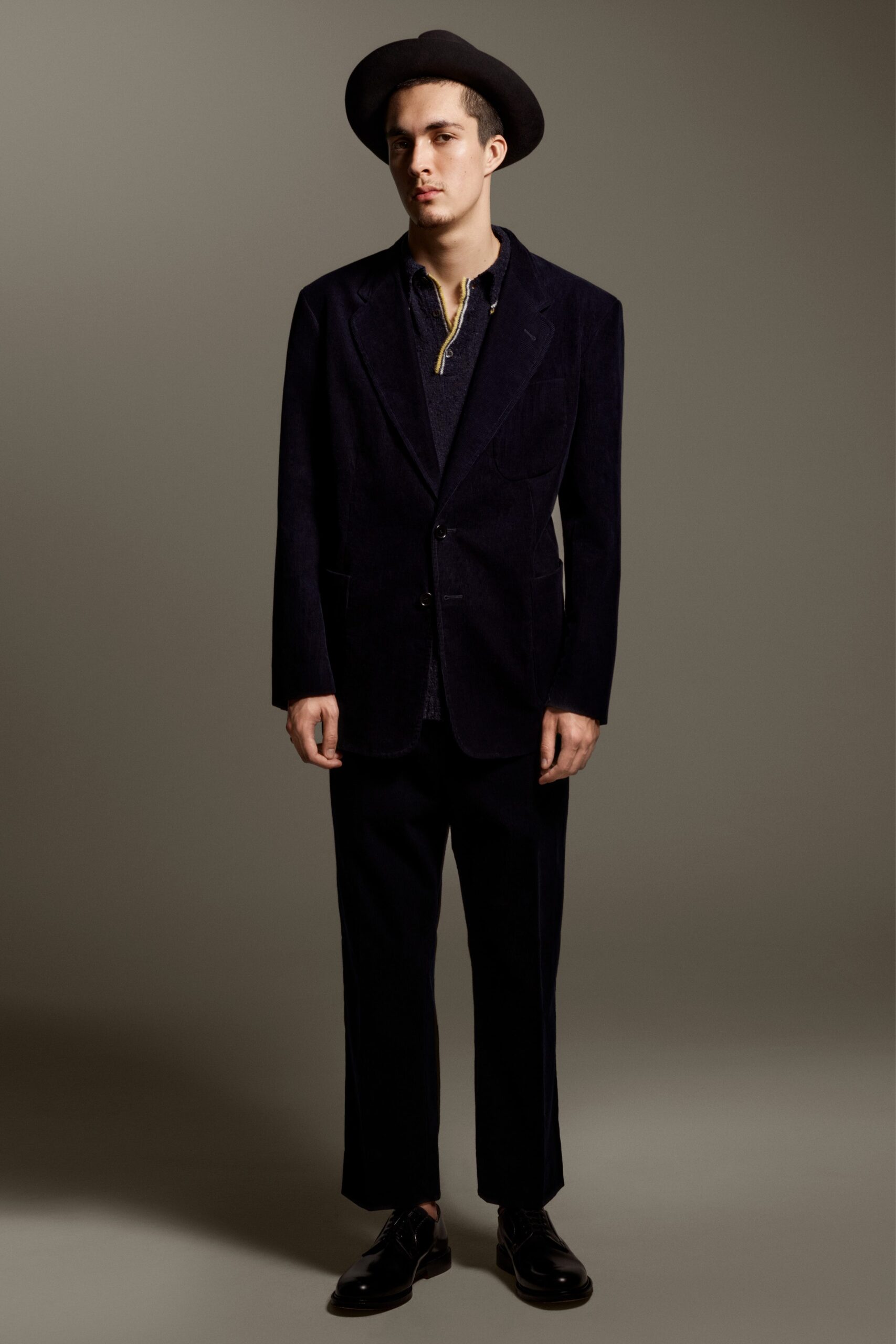 black tailored blazer with relaxed pants