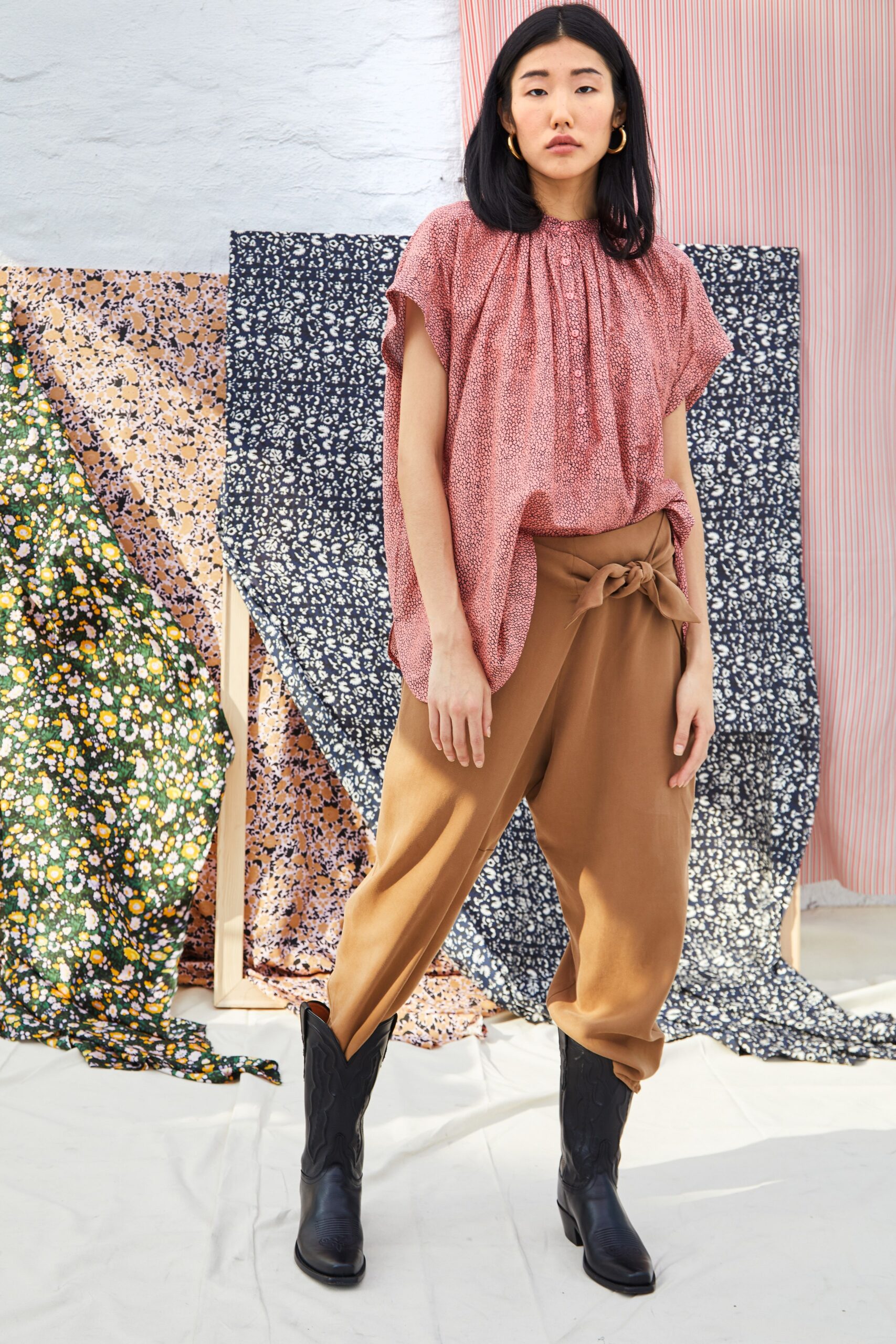 red cotton relaxed top with brown pants