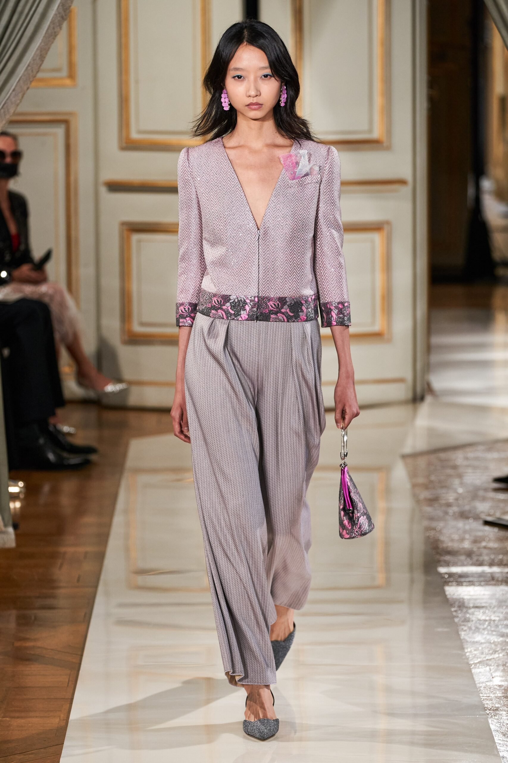 pink silk blouse with pleated pants