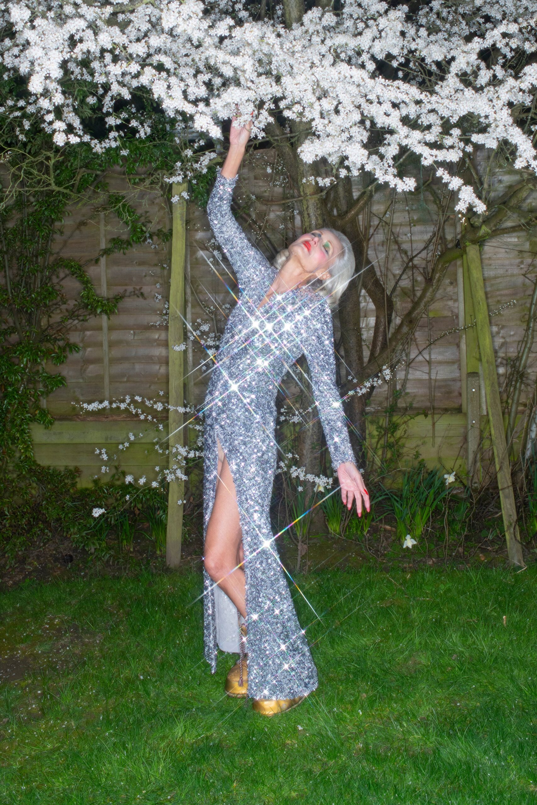 silver sequin gown with slit