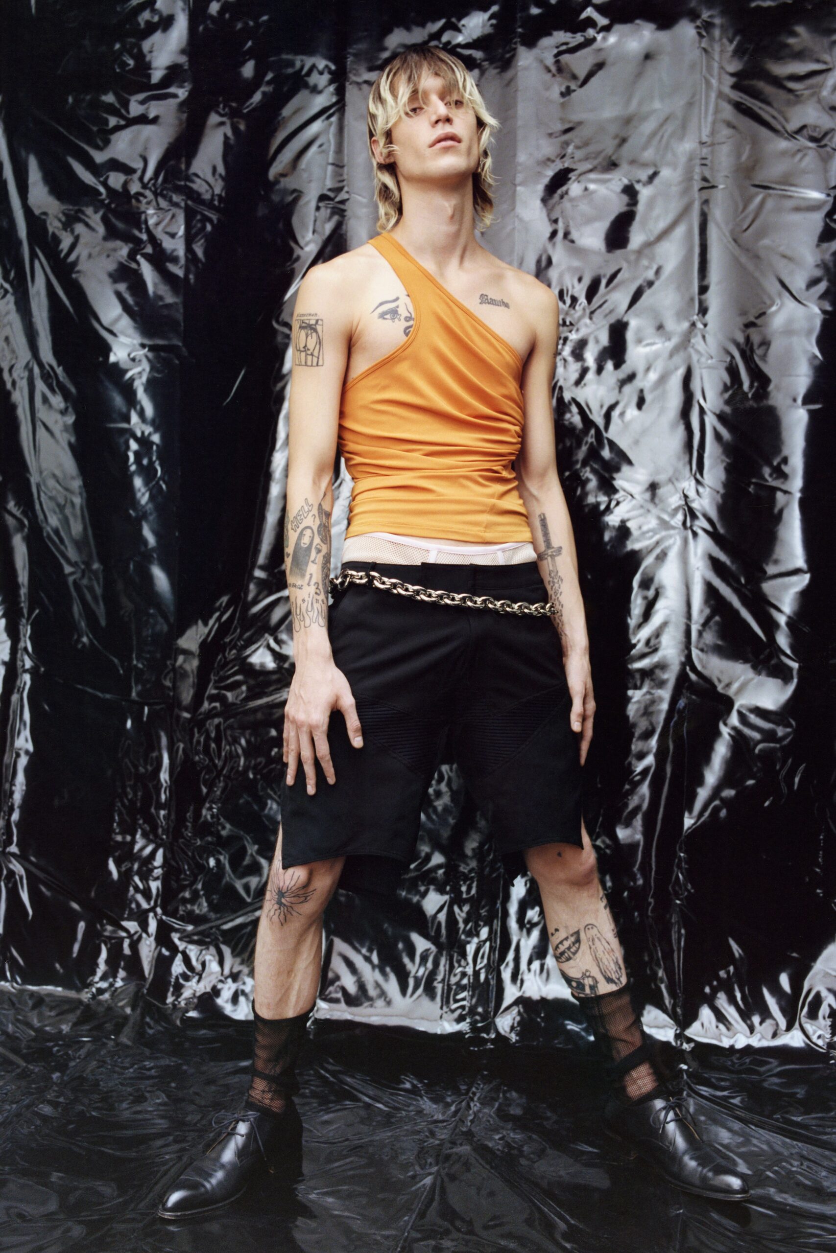 orange sleeveless asymmetric fitted top