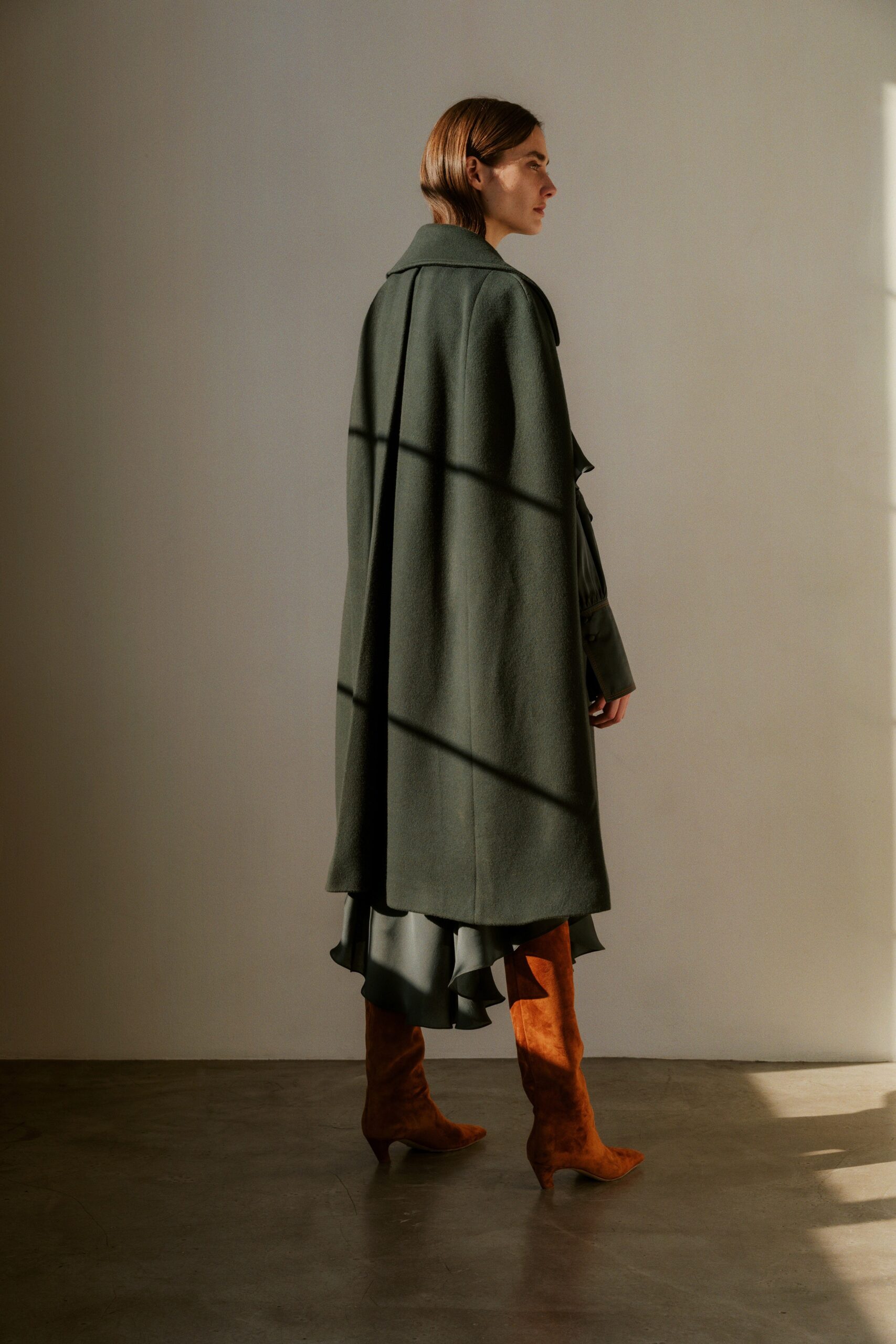 green wool long-sleeve collared relaxed draped midi cape